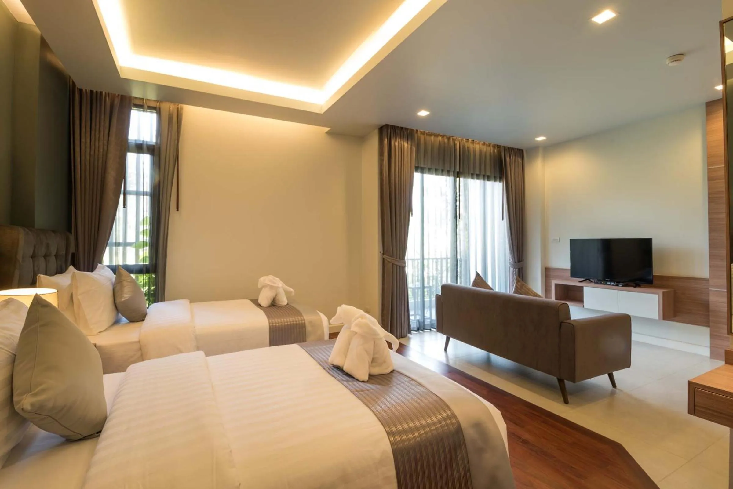 TV and multimedia, Bed in Green Ville Laguna Hotel