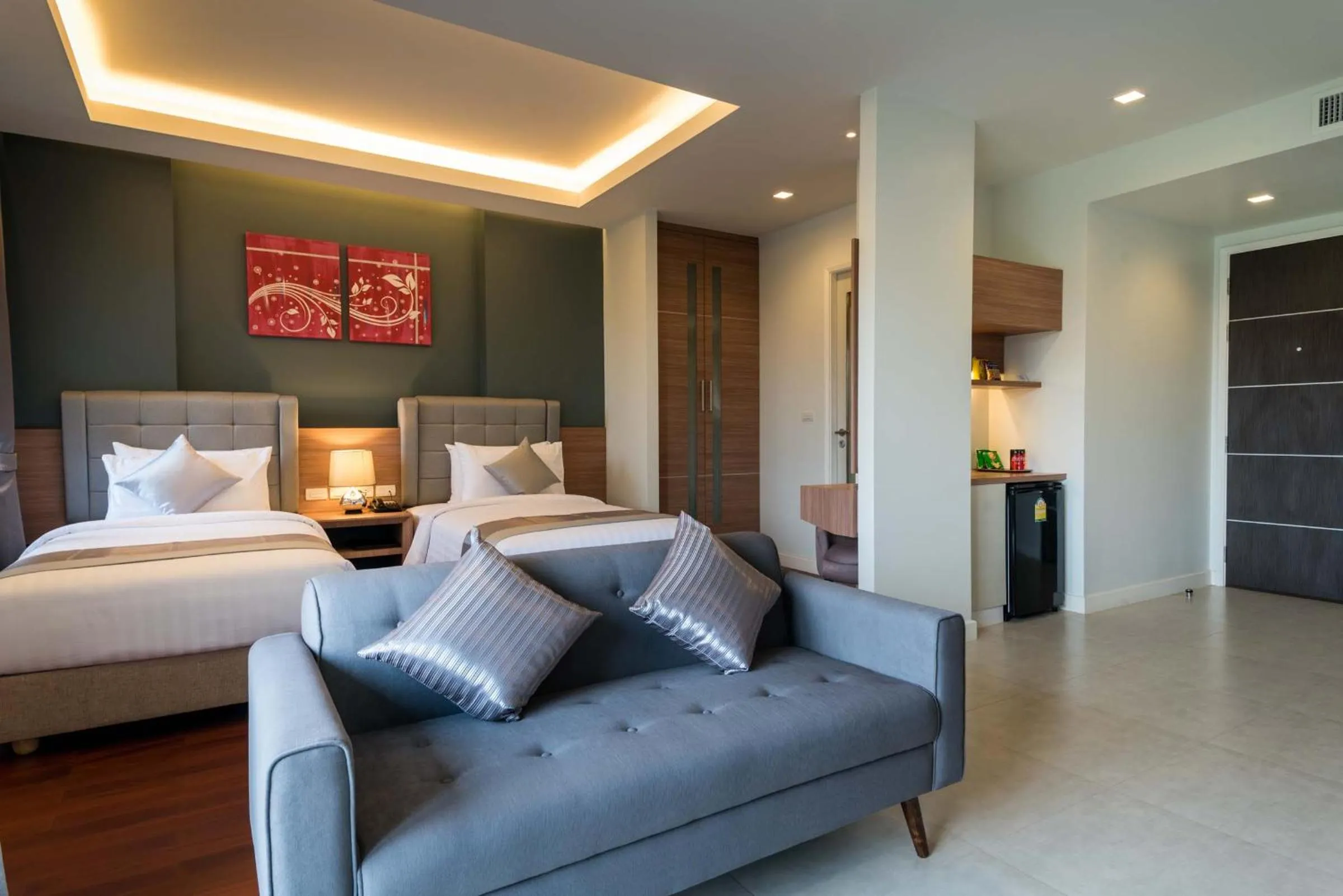 Living room, Bed in Green Ville Laguna Hotel