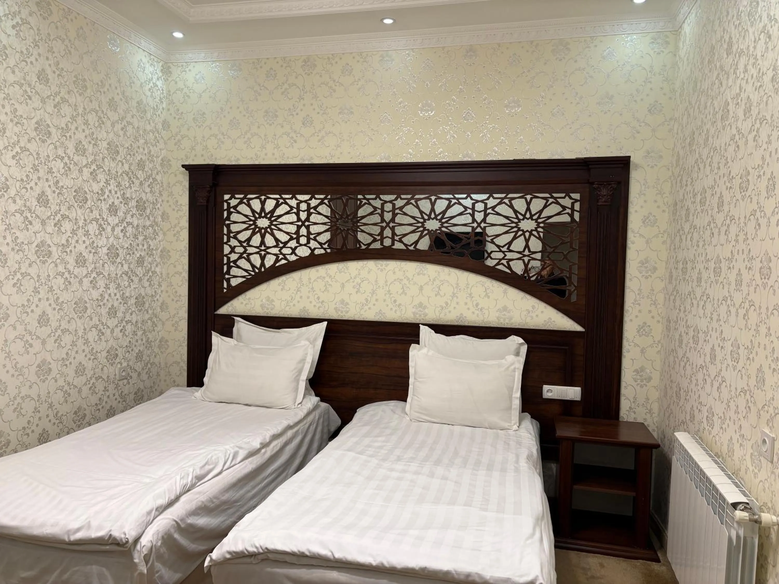 Bed in Boulevard Palace Hotel