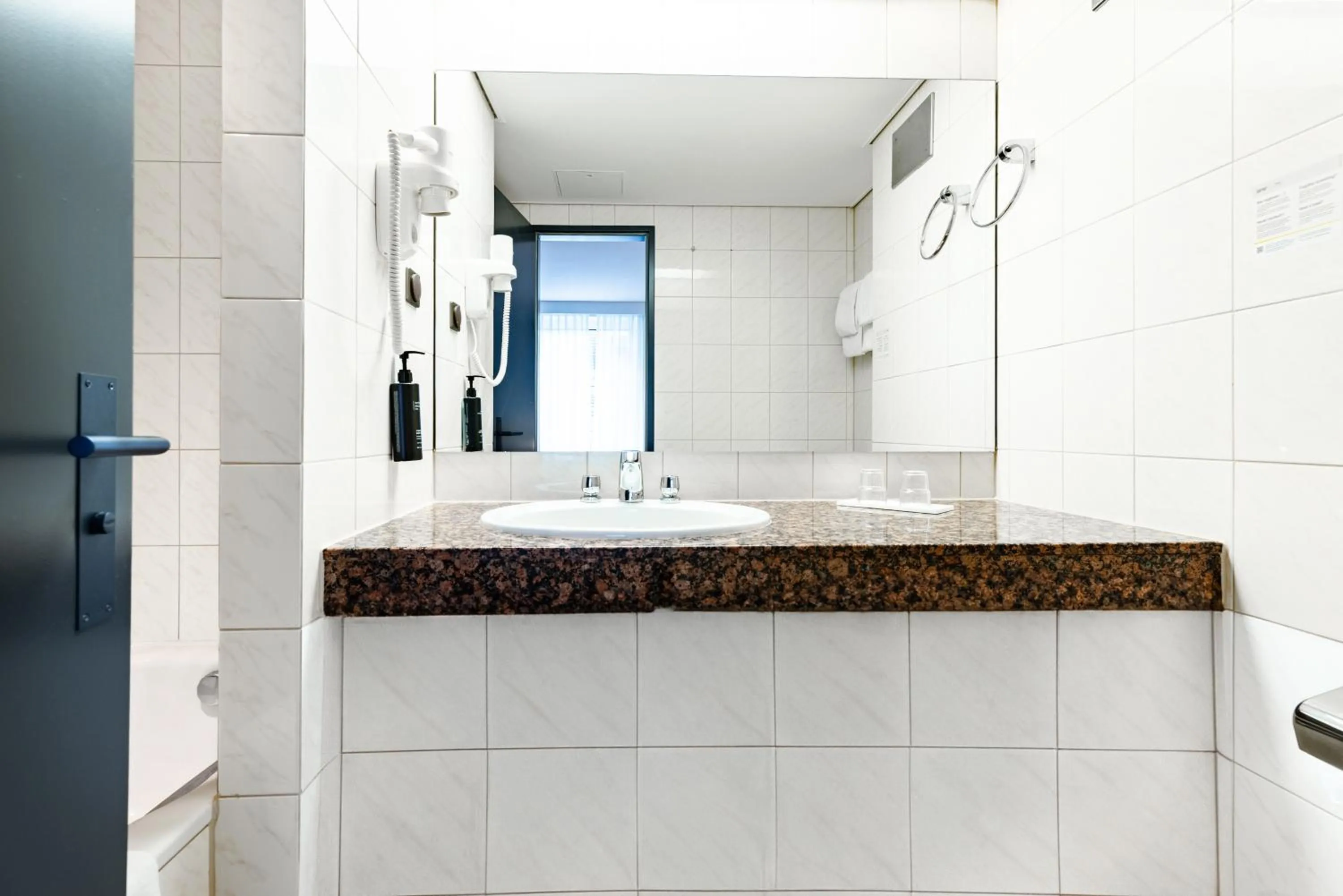 Bathroom in Garner Hotel Dusseldorf - Main Station by IHG