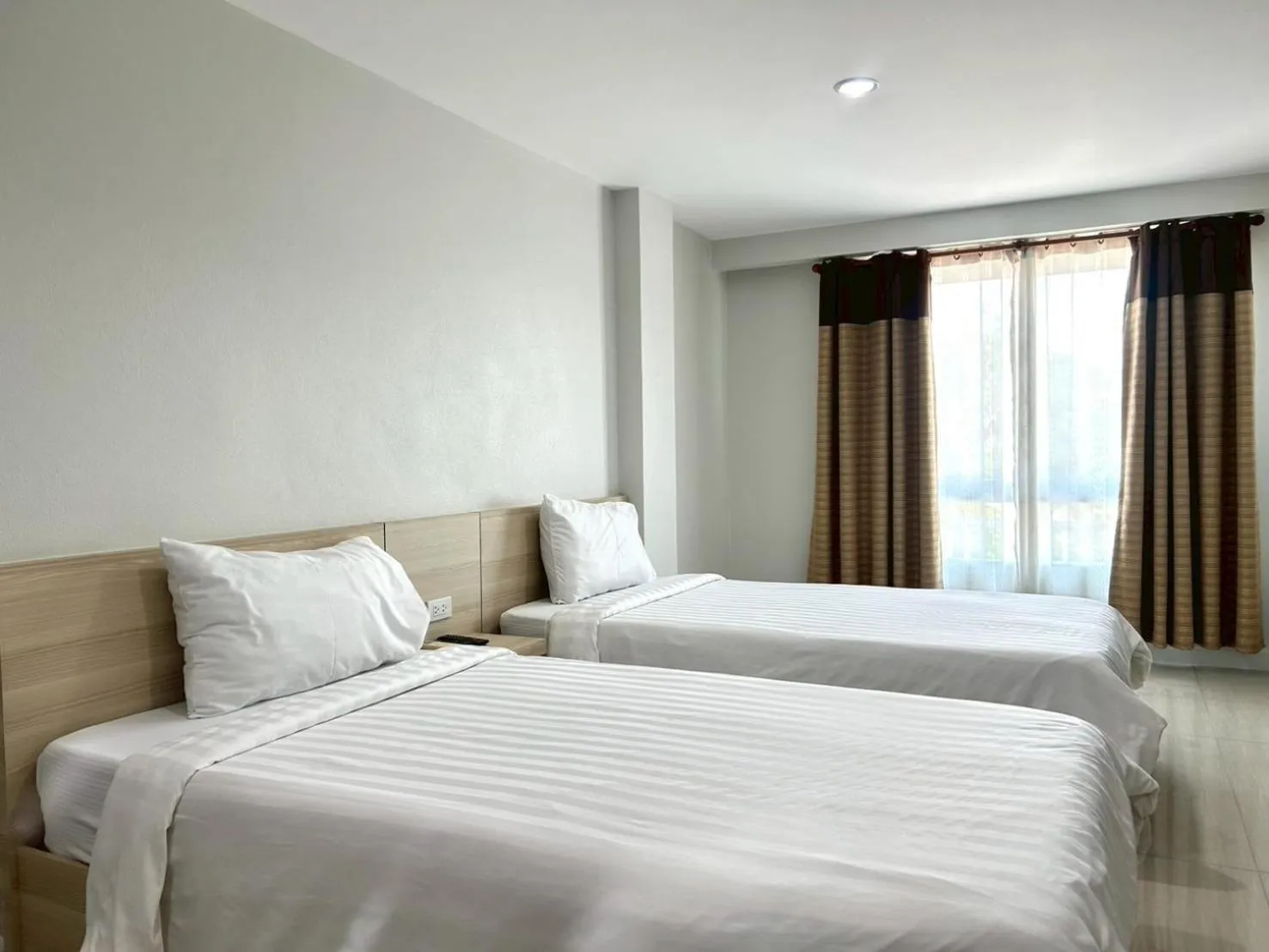 Bed in DD Boutique Resort