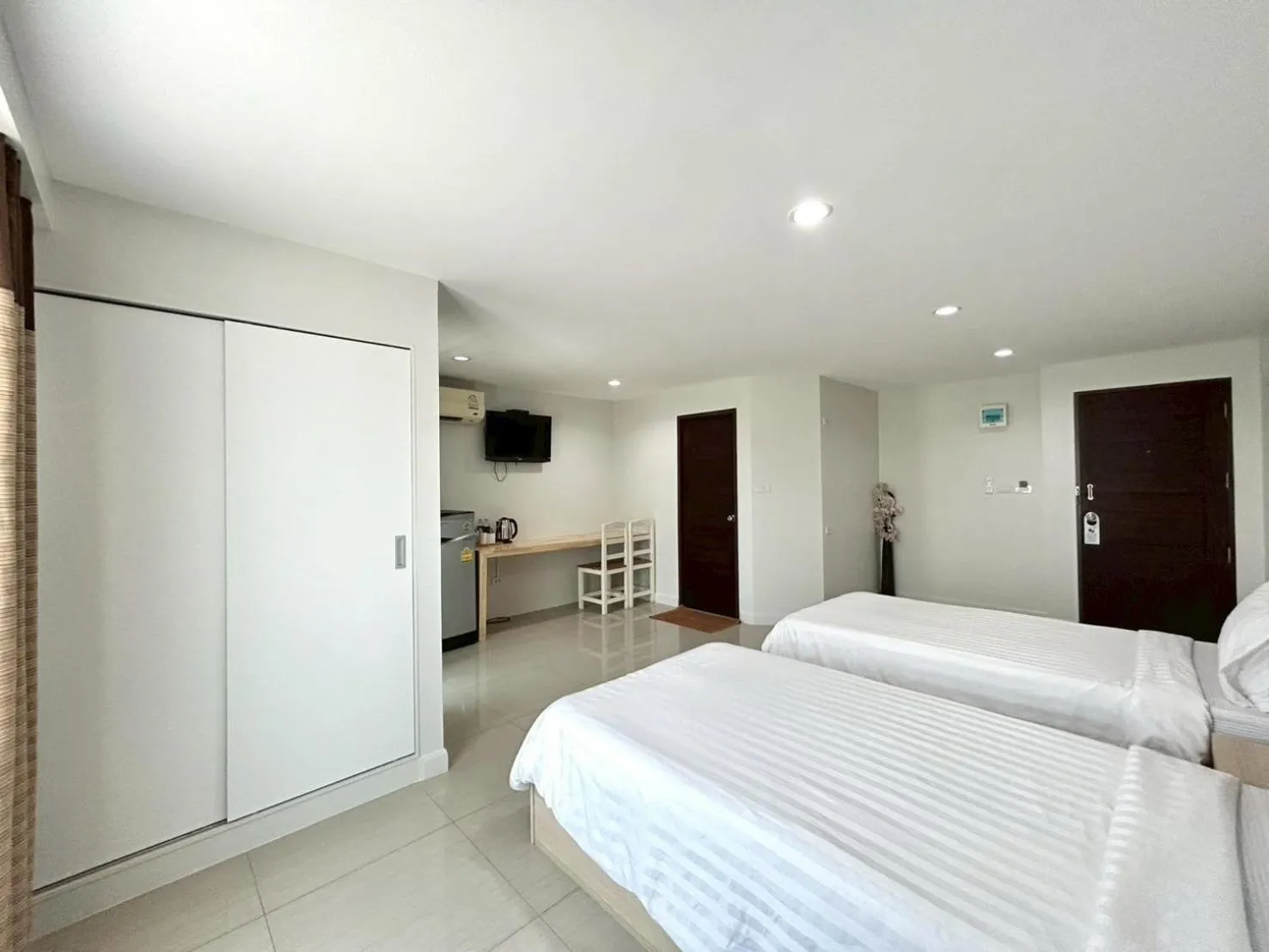 Bed in DD Boutique Resort