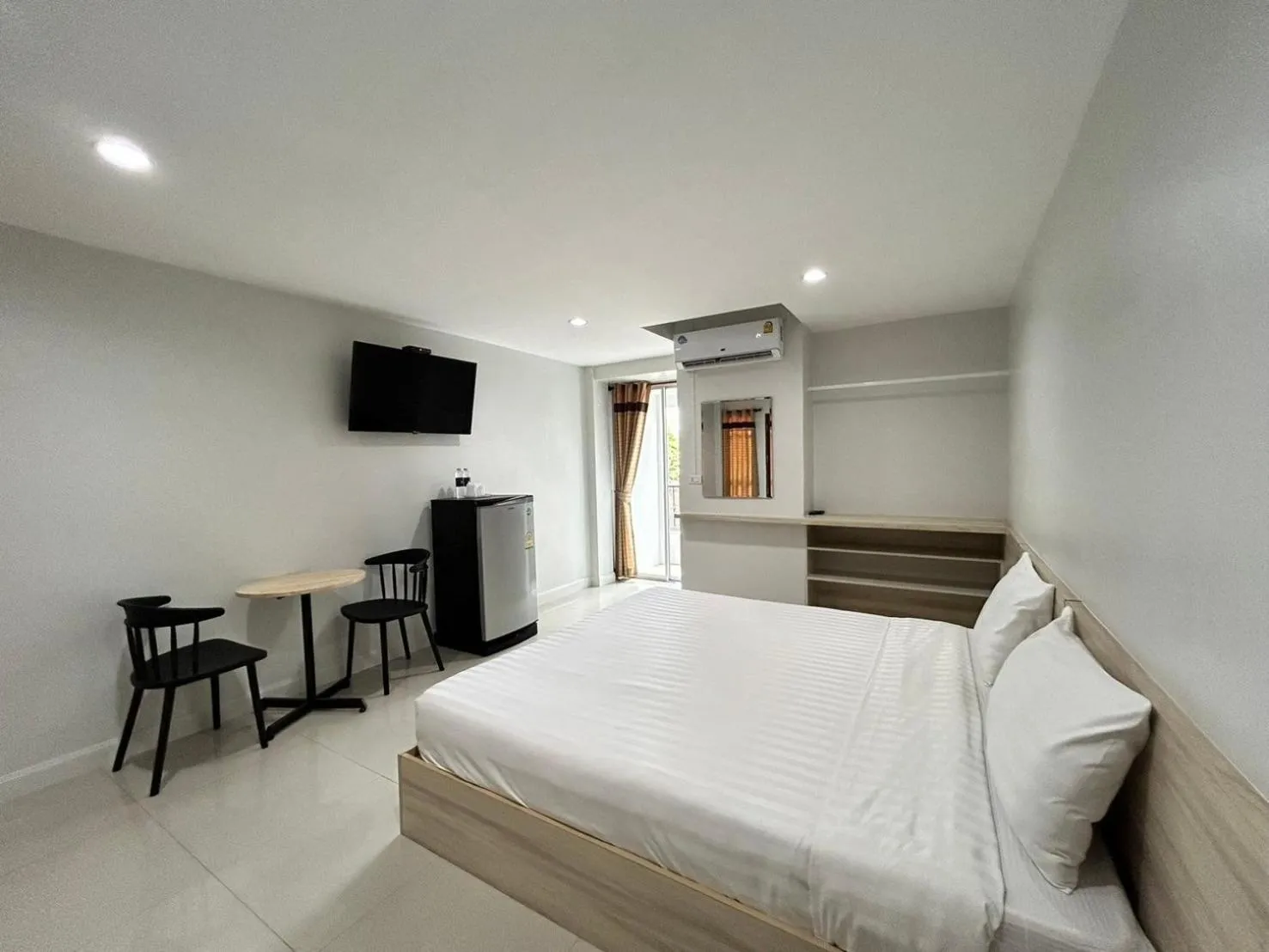 Bed in DD Boutique Resort