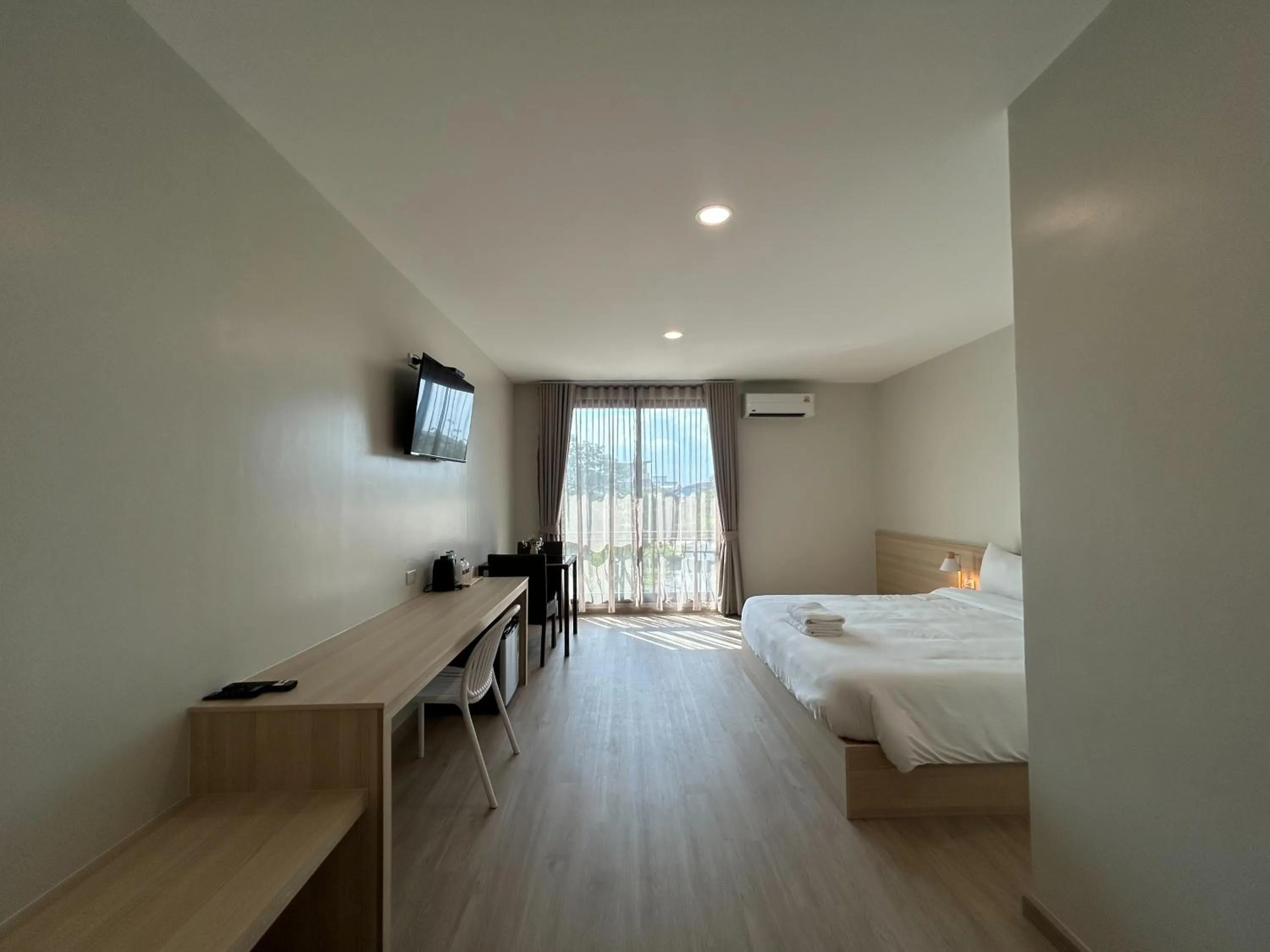 Bed in DD Boutique Resort