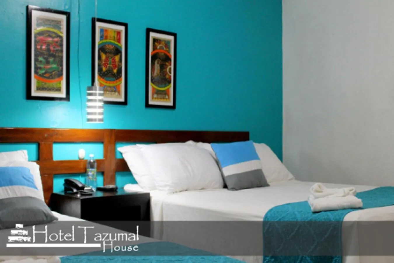 Bed in Hotel Tazumal House