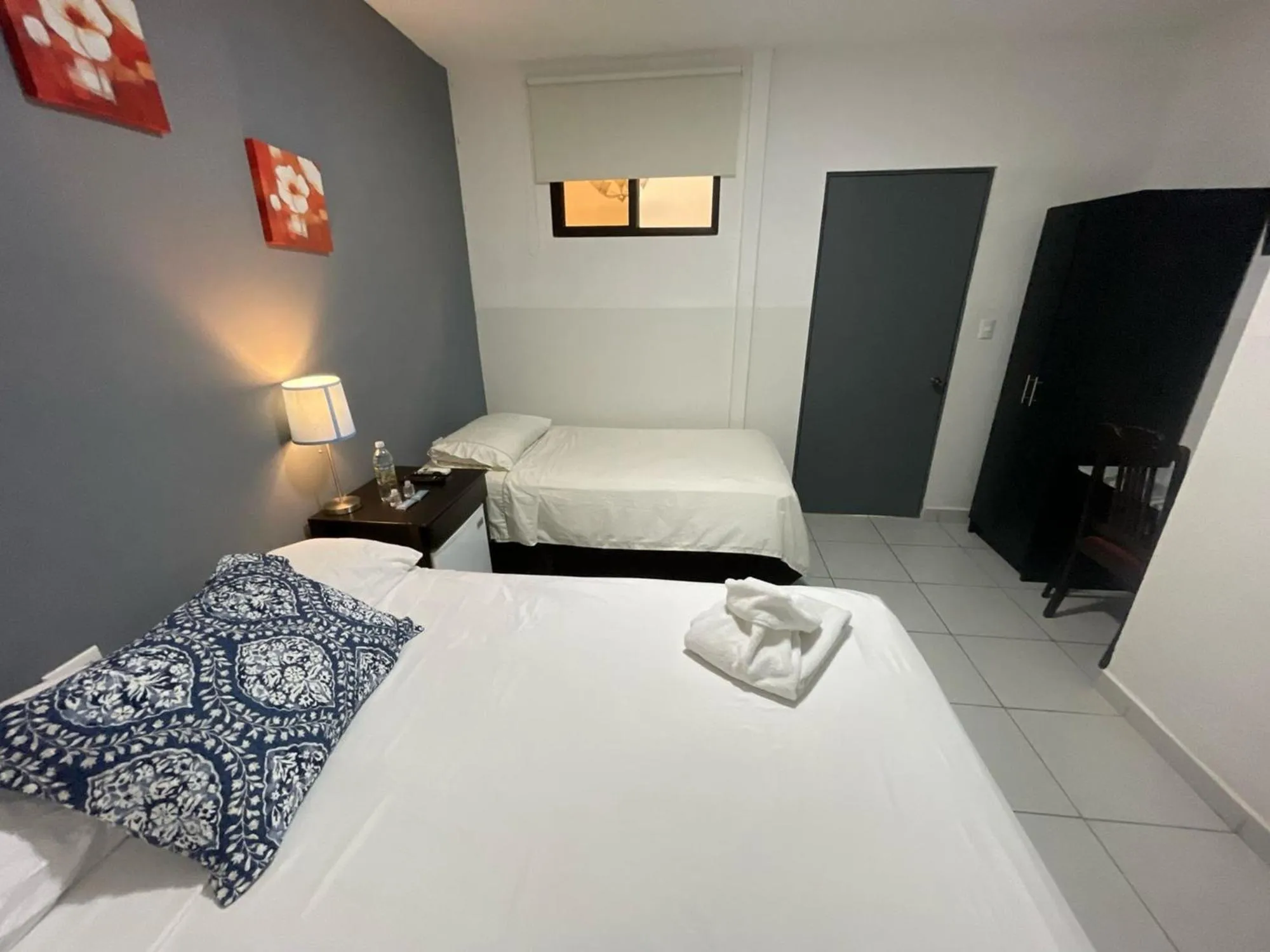 Bed in Hotel Tazumal House