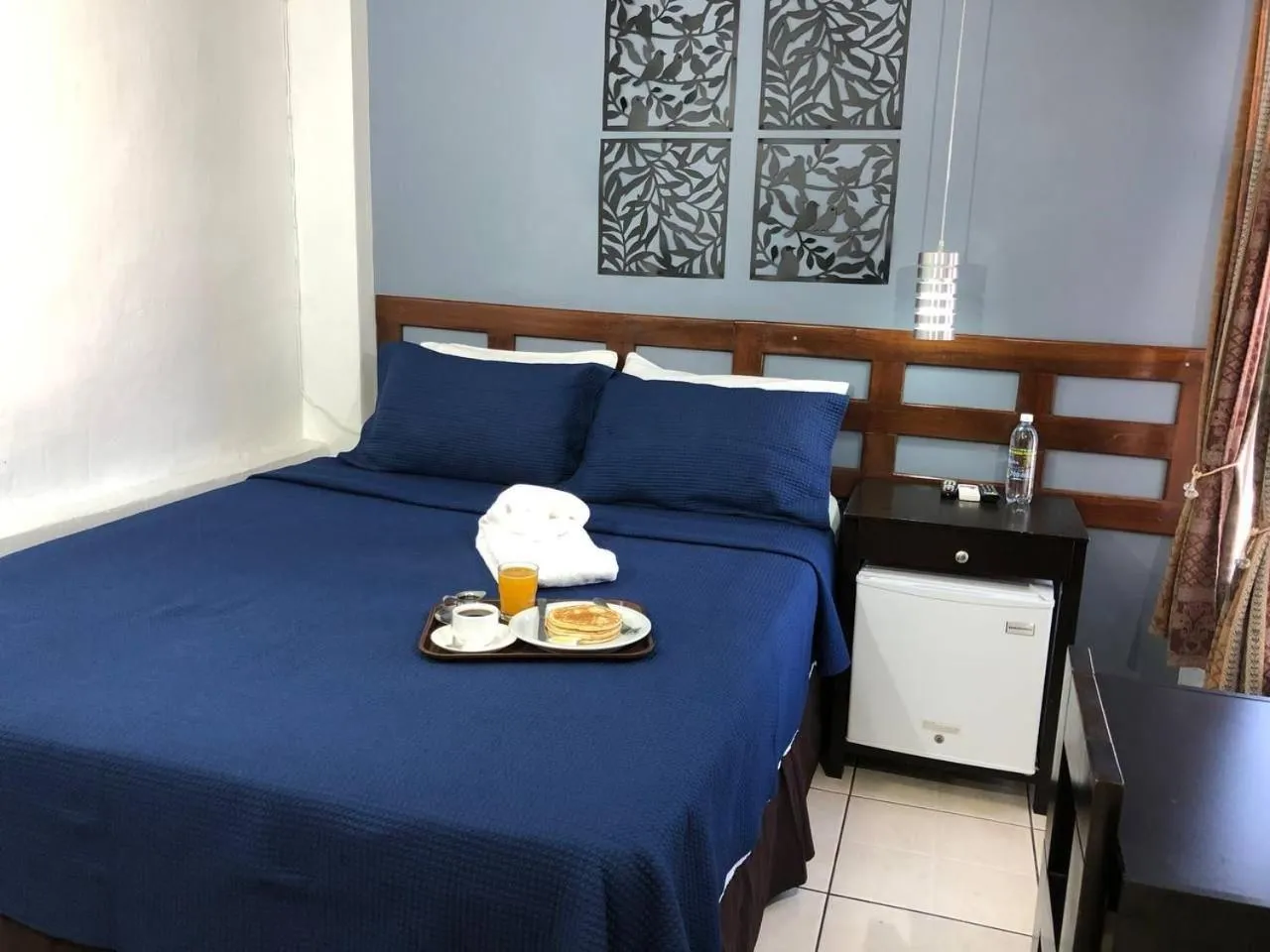 Bed in Hotel Tazumal House