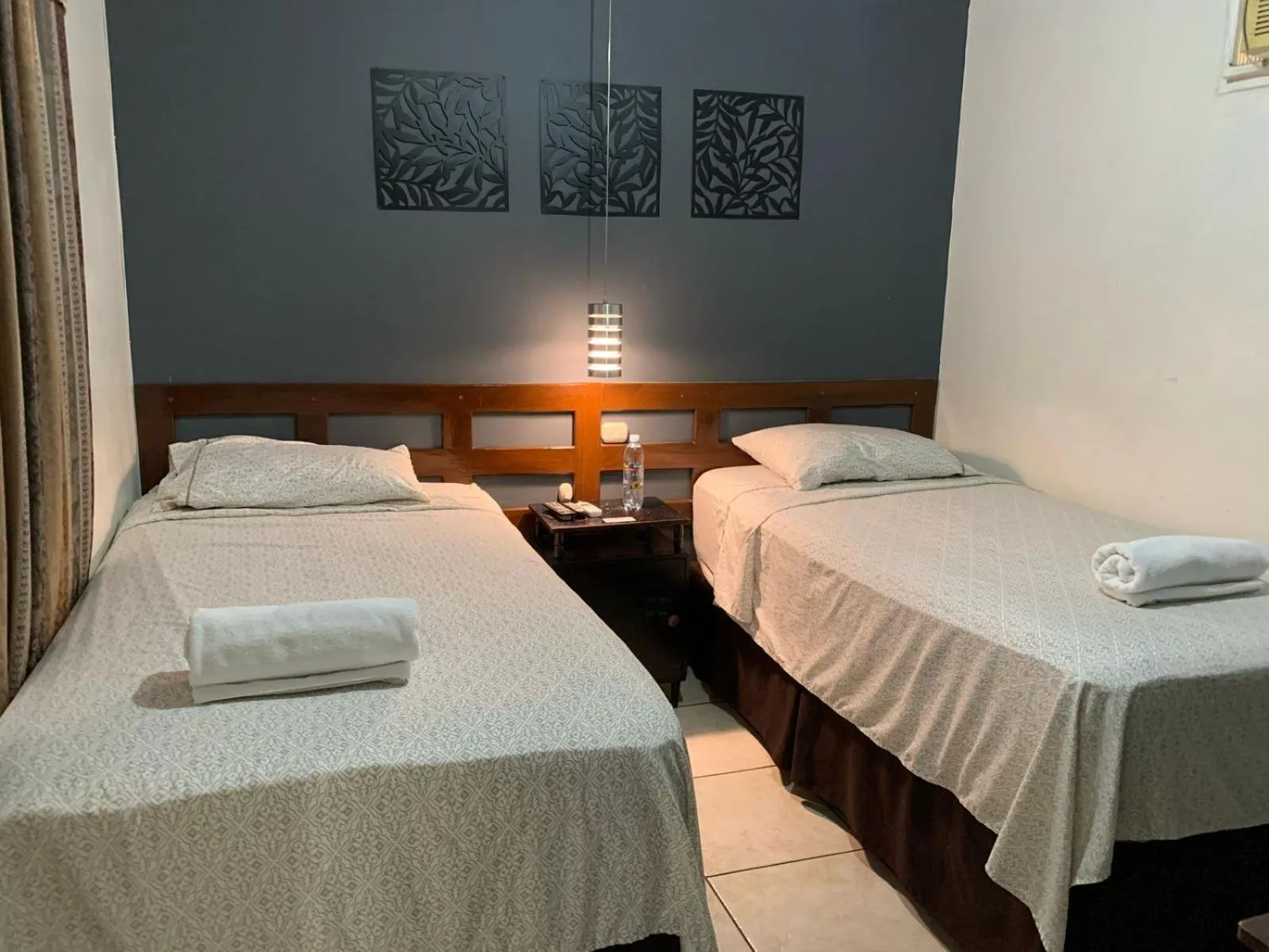 Bed in Hotel Tazumal House