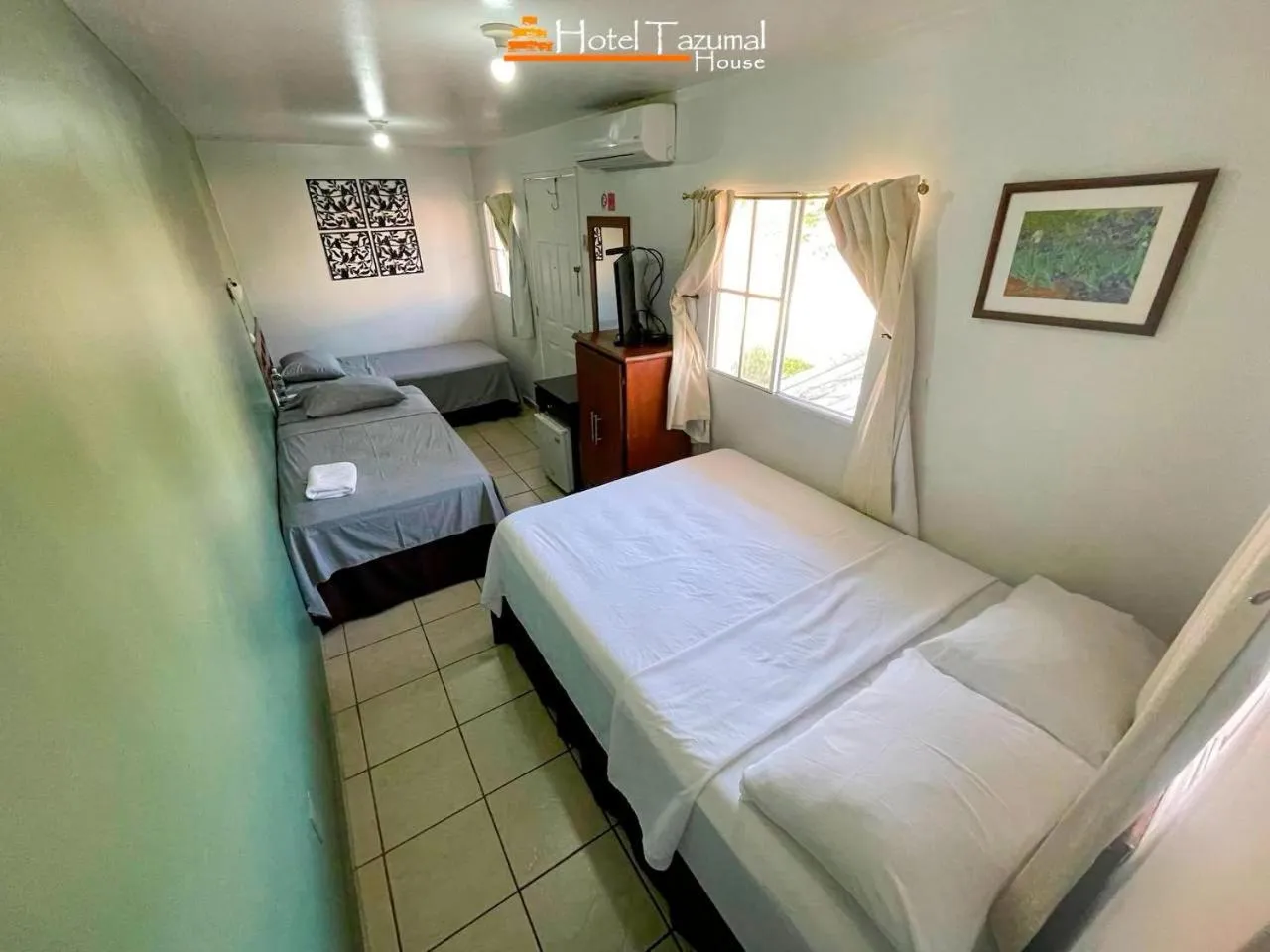 Bed in Hotel Tazumal House