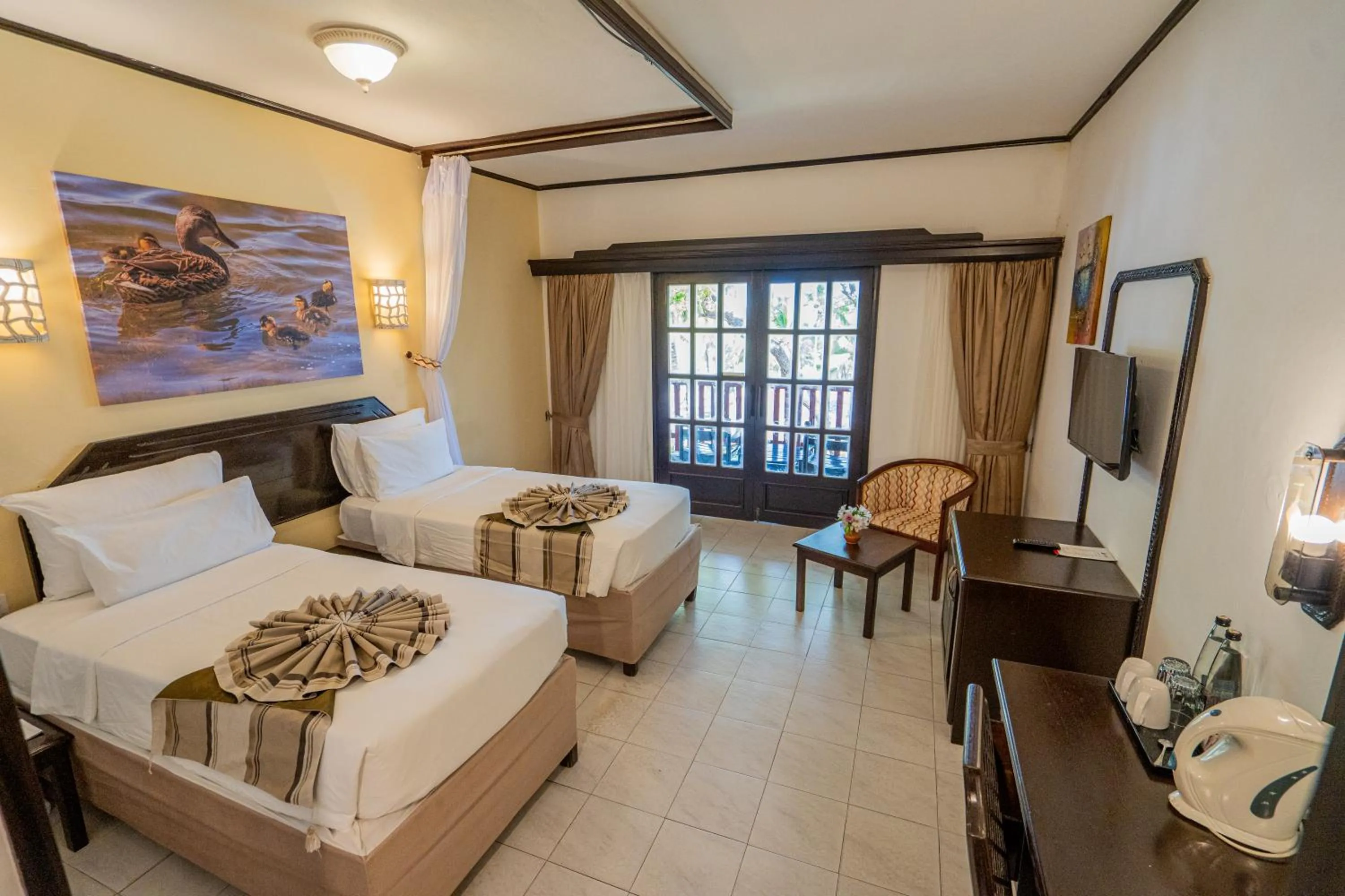 Bed in PrideInn Flamingo Beach Resort & Spa Mombasa