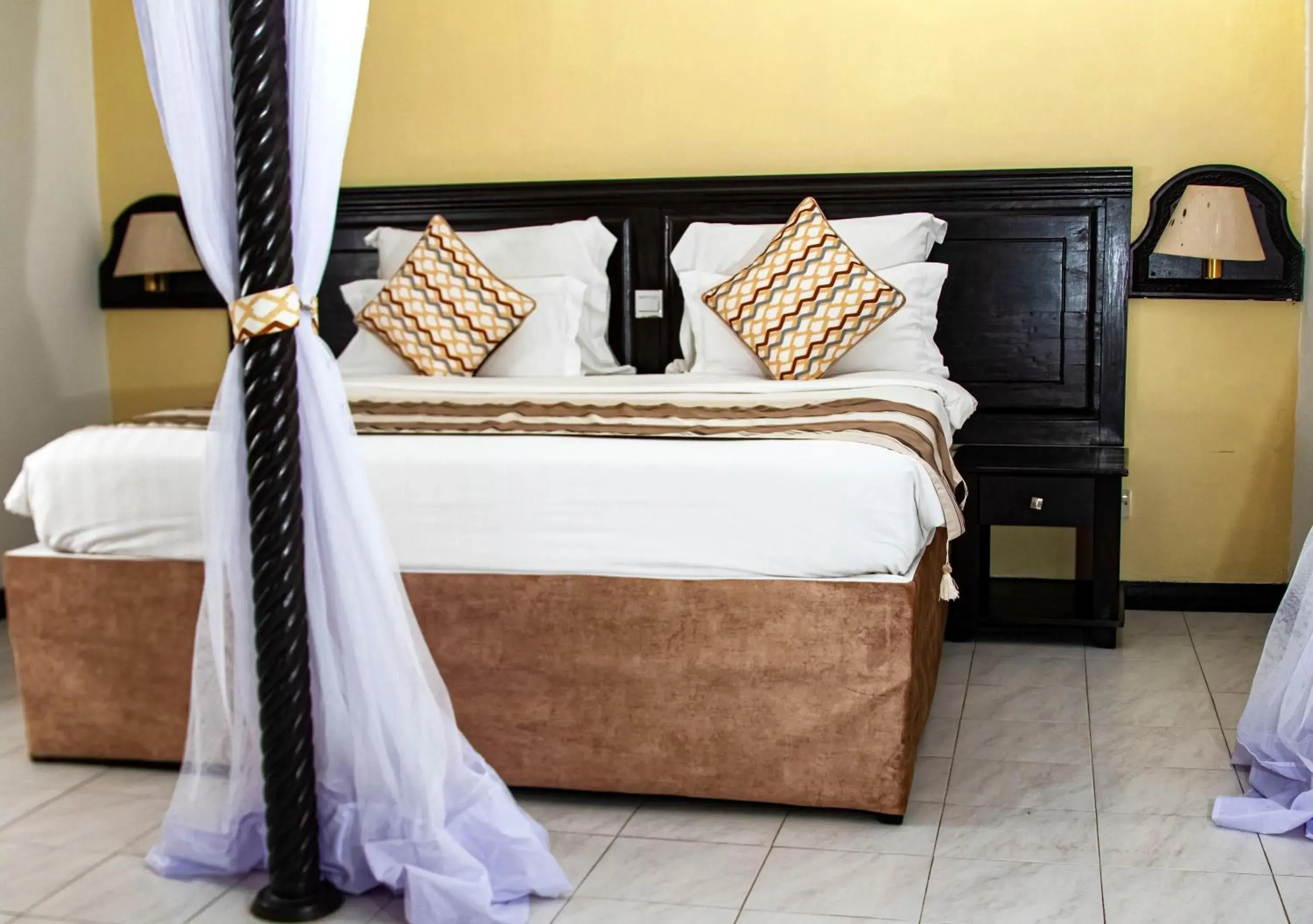 Bed in PrideInn Flamingo Beach Resort & Spa Mombasa Bed in PrideInn Flamingo Beach Resort & Spa Mombasa