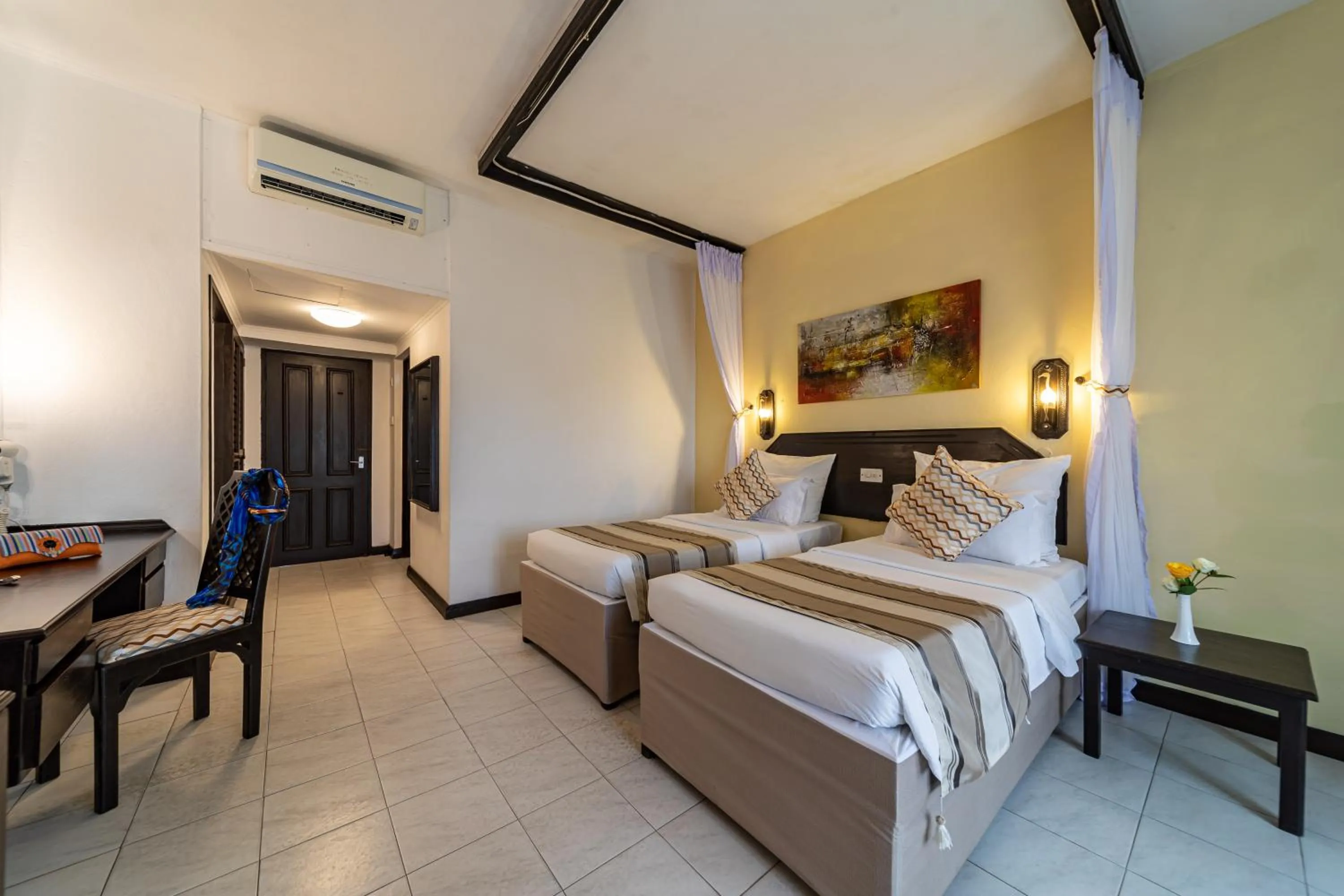 Bed in PrideInn Flamingo Beach Resort & Spa Mombasa