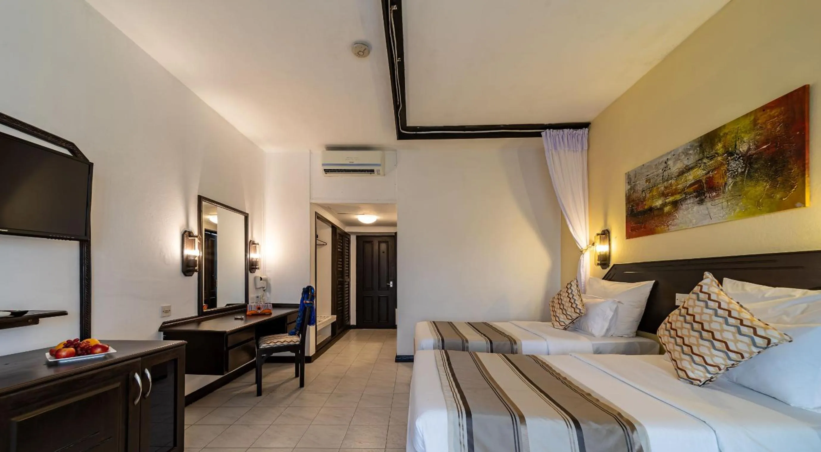 Bed in PrideInn Flamingo Beach Resort & Spa Mombasa