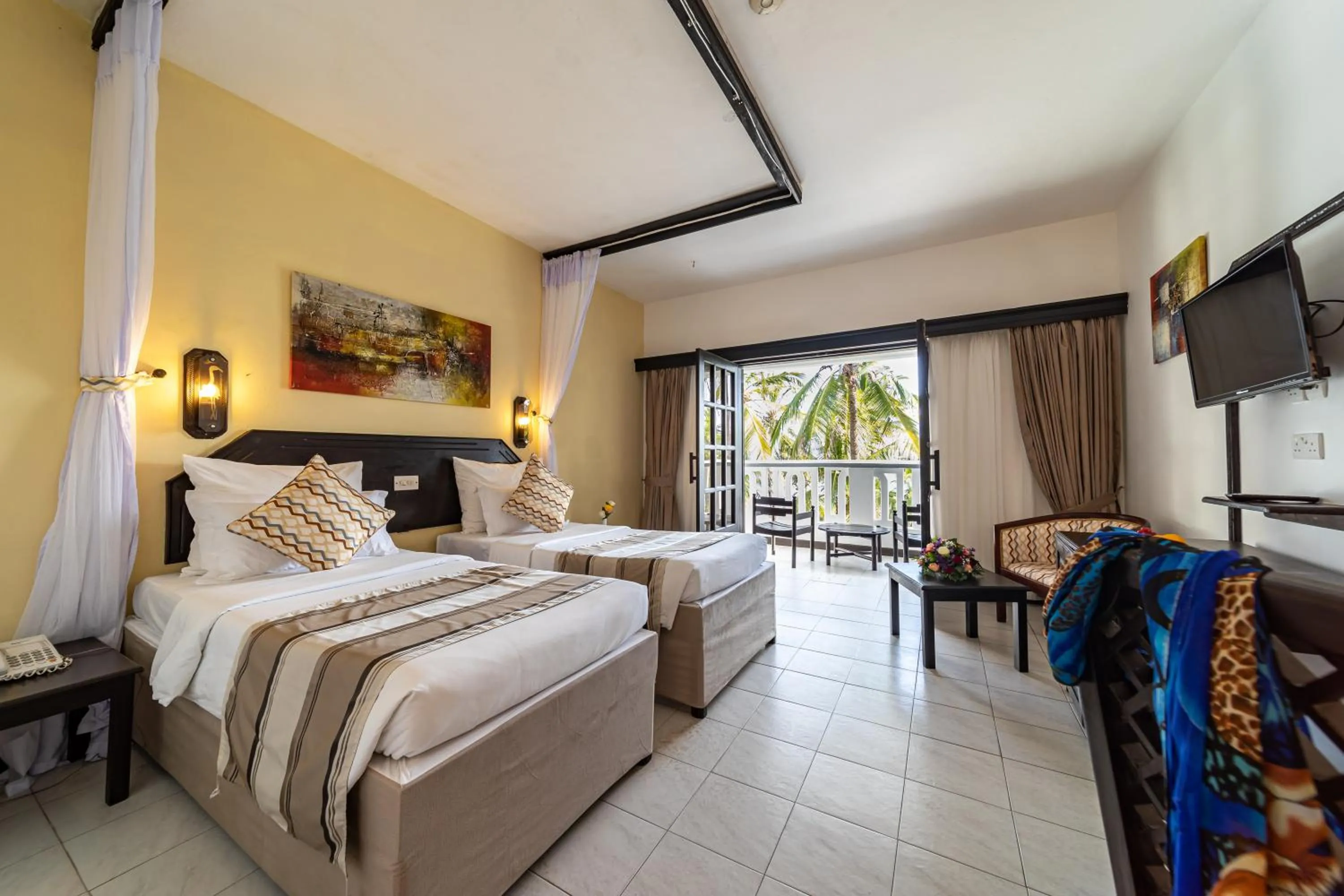 Bed in PrideInn Flamingo Beach Resort & Spa Mombasa