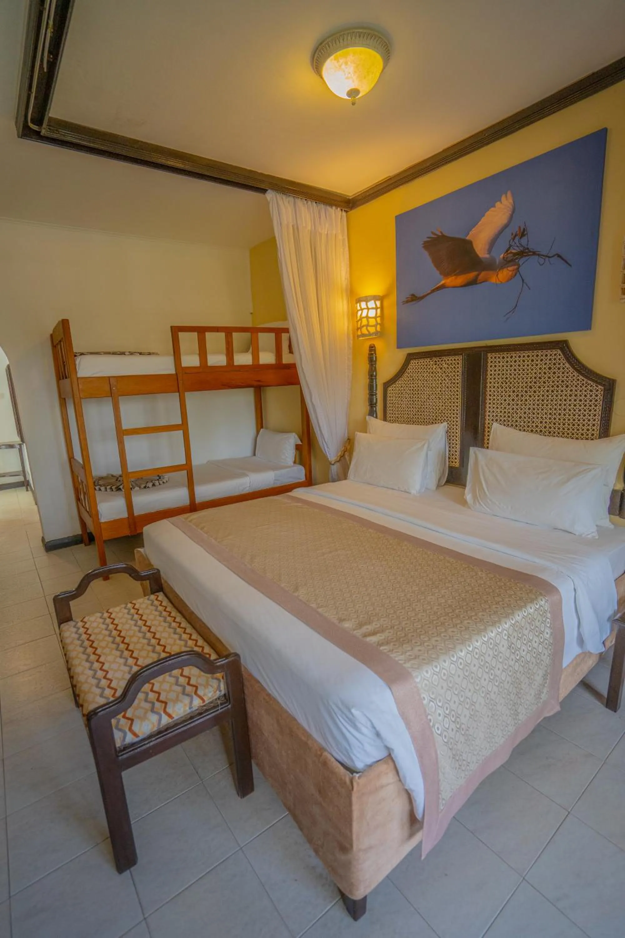 Bed in PrideInn Flamingo Beach Resort & Spa Mombasa
