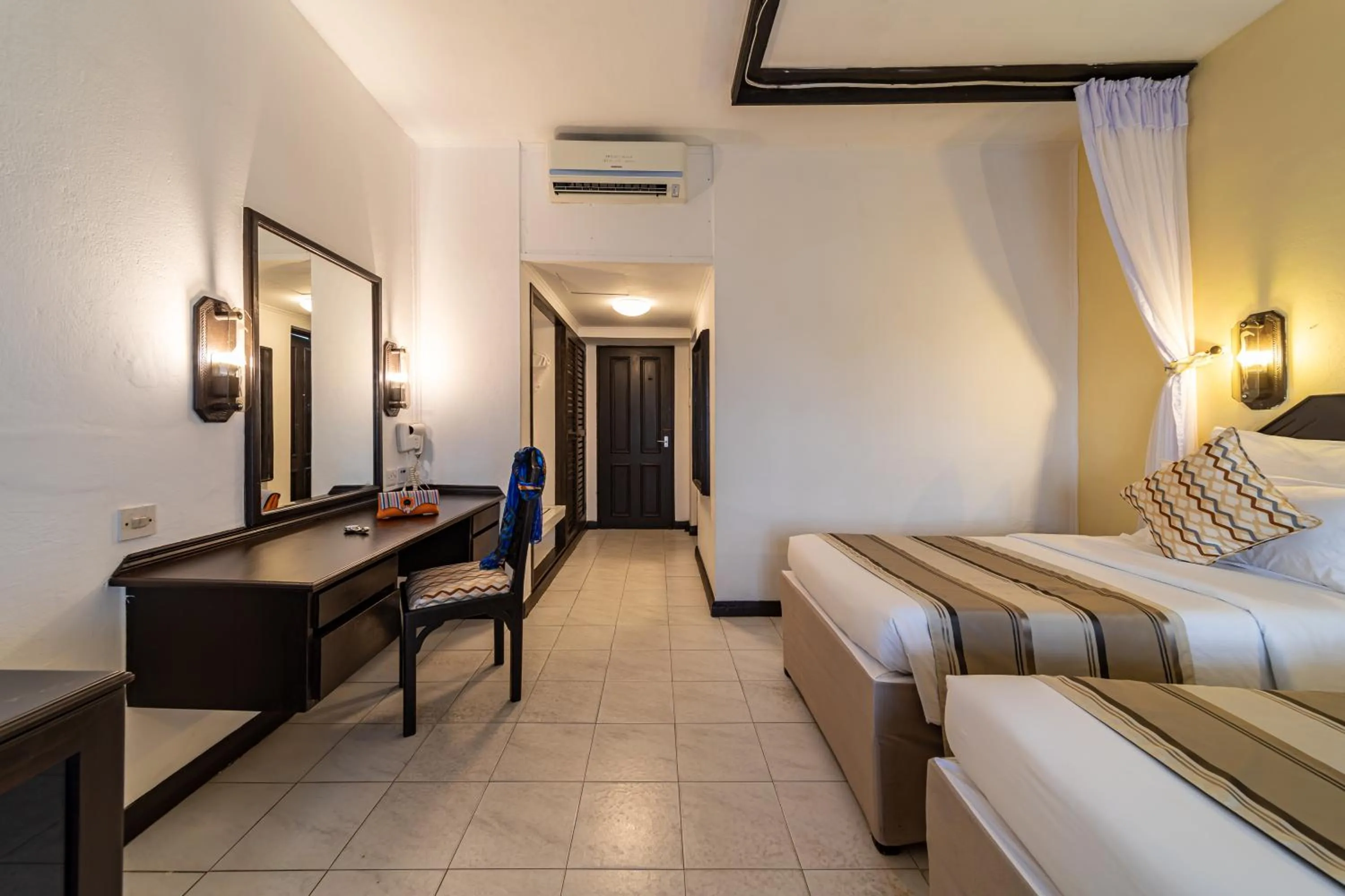 Bed in PrideInn Flamingo Beach Resort & Spa Mombasa