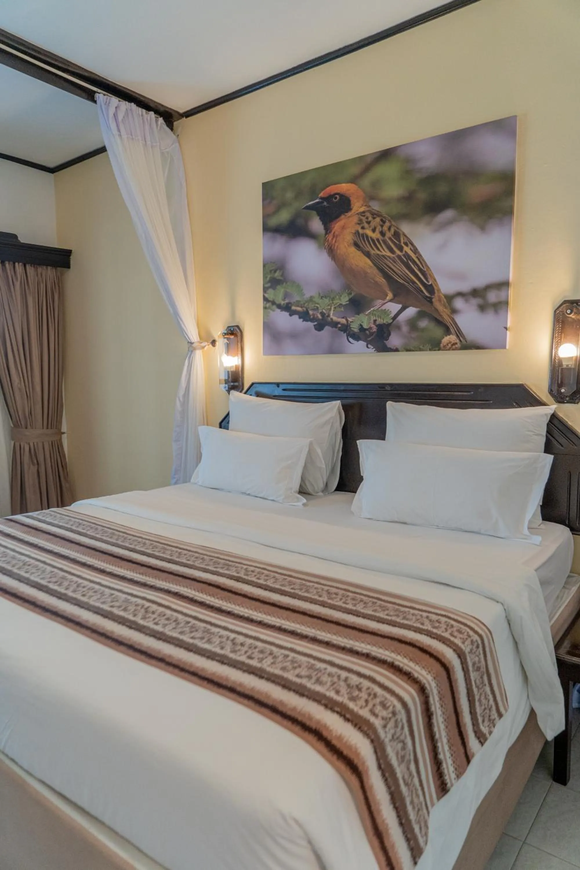 Bed in PrideInn Flamingo Beach Resort & Spa Mombasa