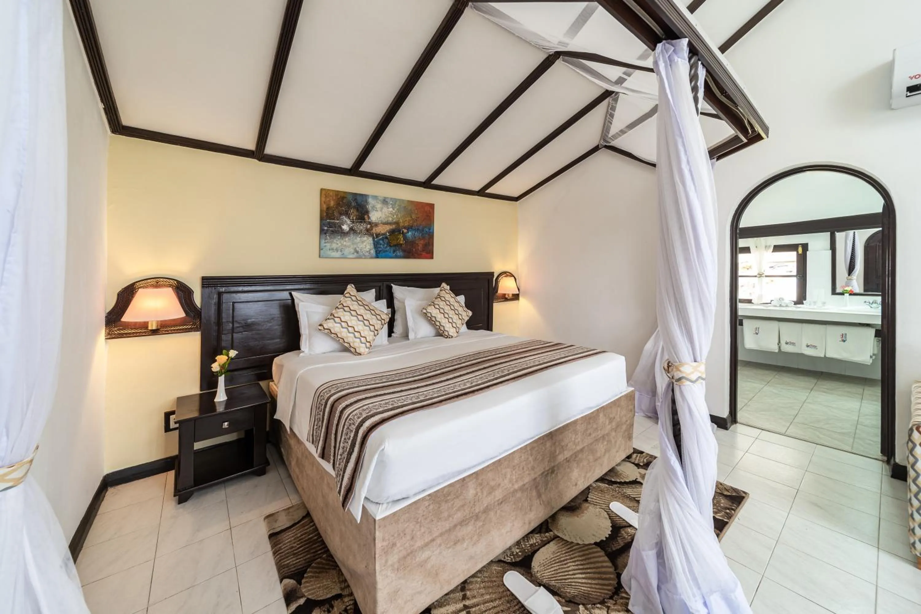 Bed in PrideInn Flamingo Beach Resort & Spa Mombasa