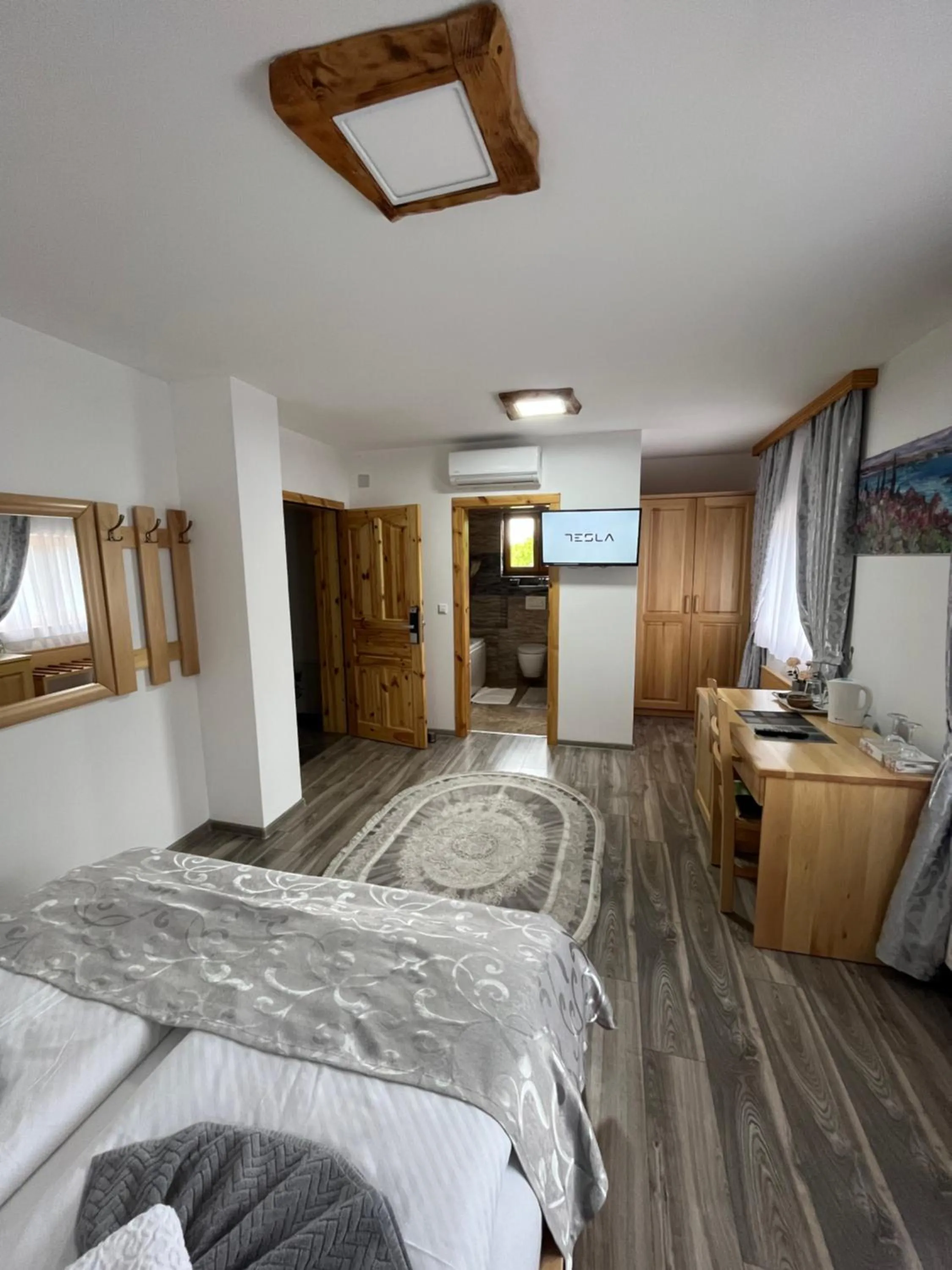 Bed in Rustic Inn River