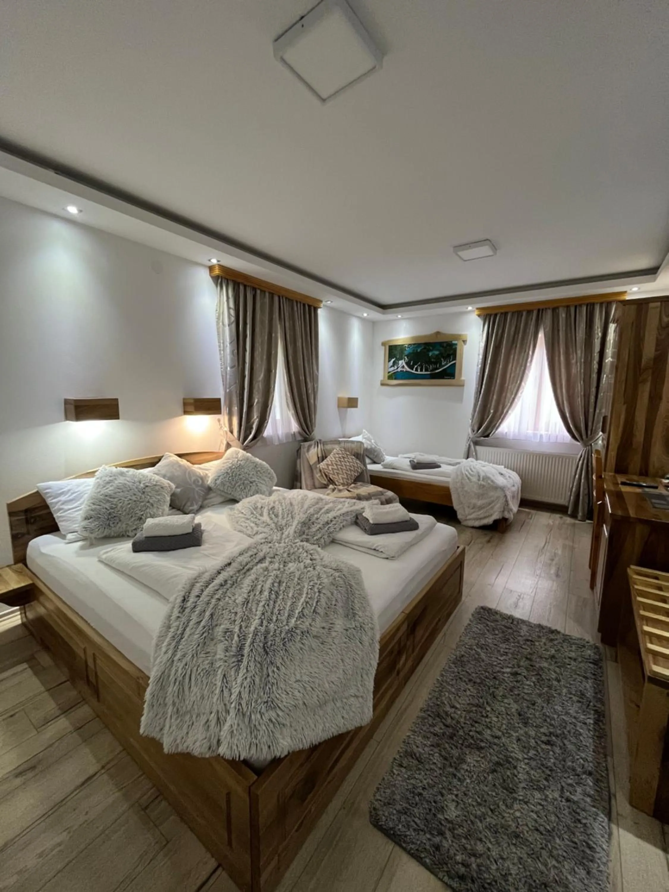 Bed in Rustic Inn River