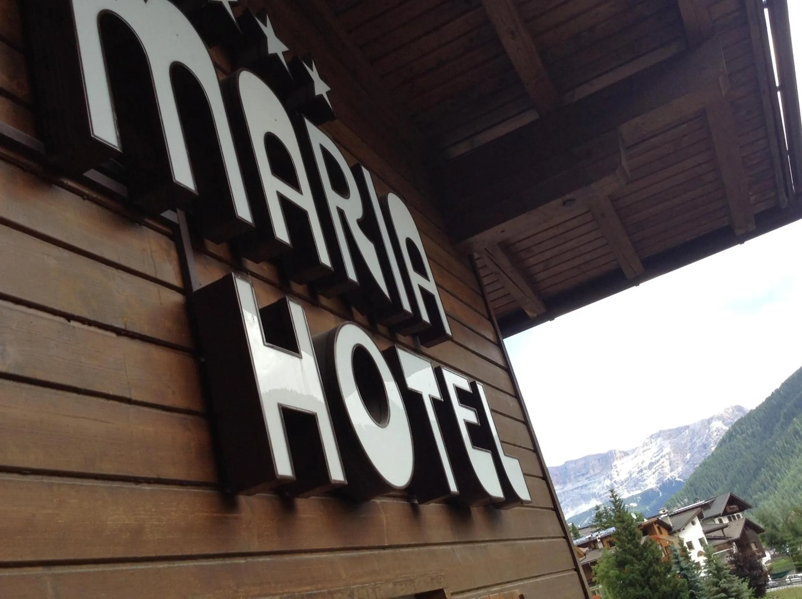 Property logo or sign in Hotel Maria