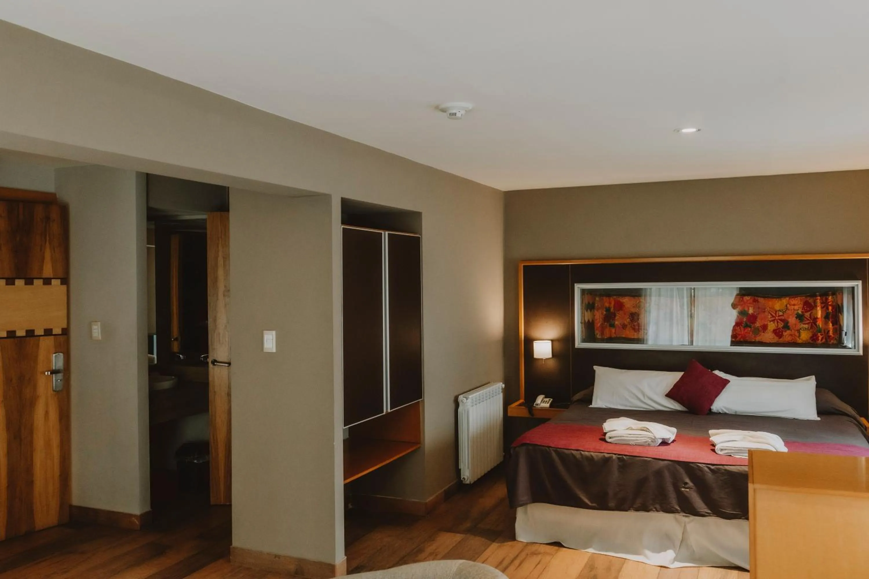 Bed in Plaza Paradiso Petit Hotel