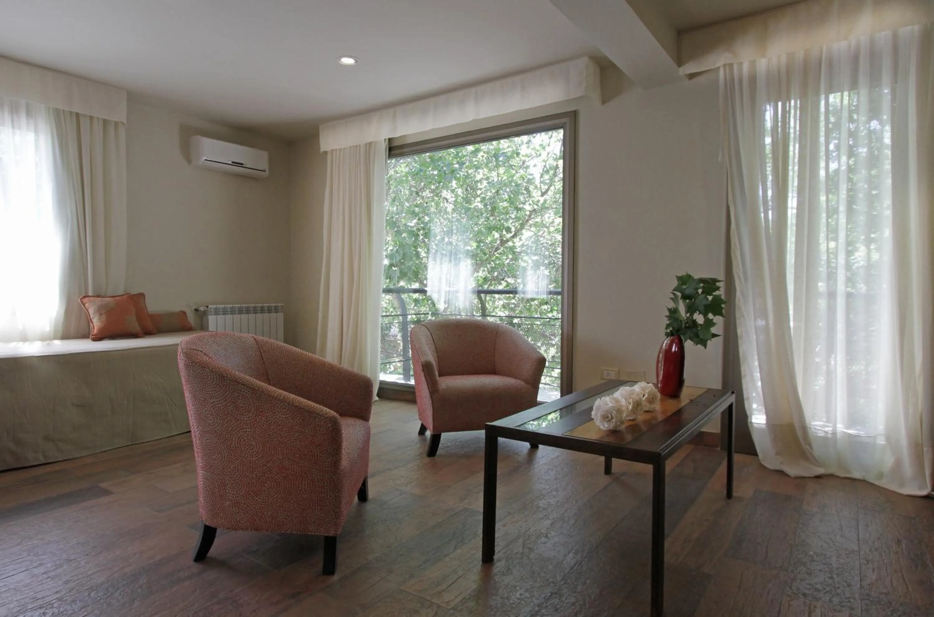 Seating area in Plaza Paradiso Petit Hotel