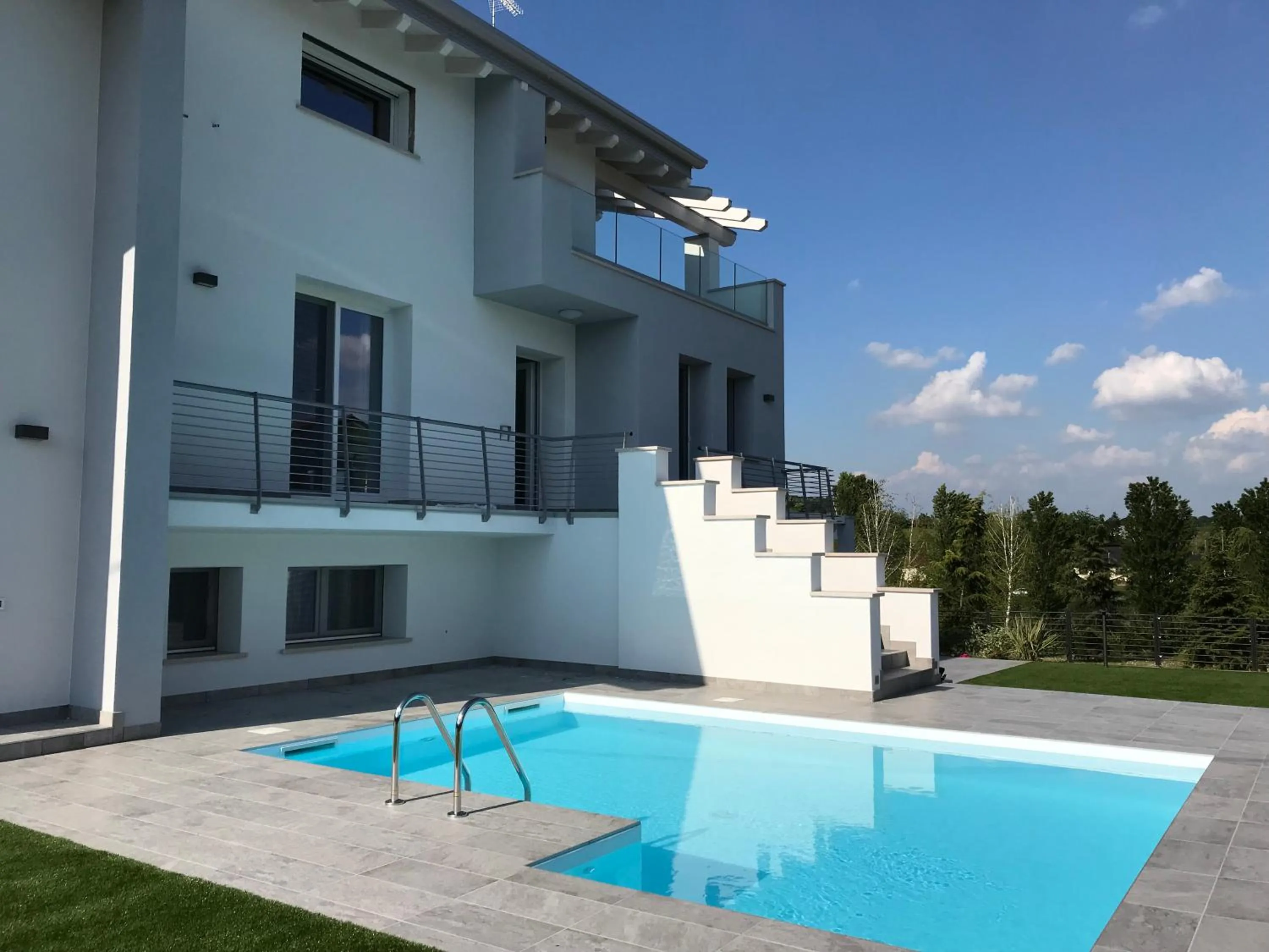 Swimming pool in B&B Alma Garda Lake