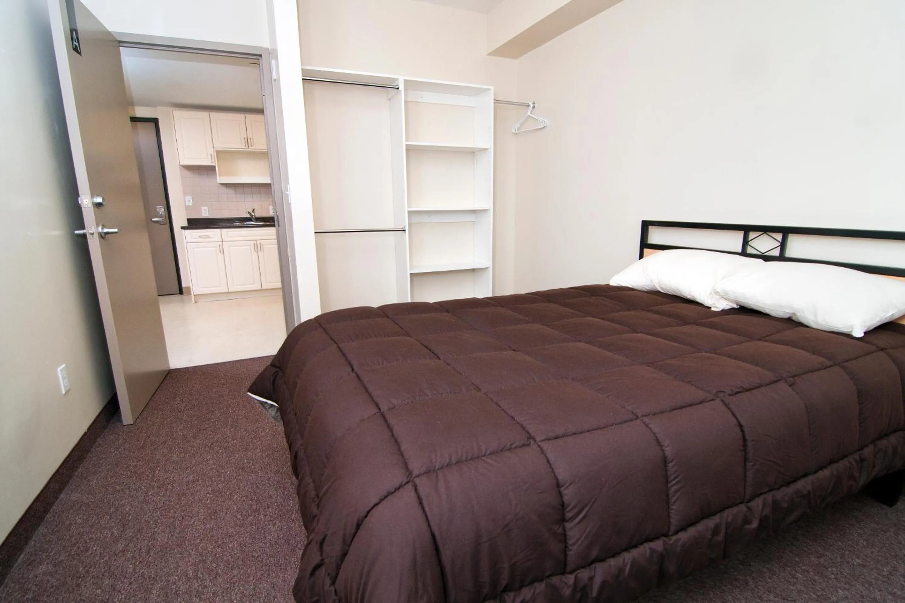 Bedroom, Bed in Residence & Conference Centre - North Bay