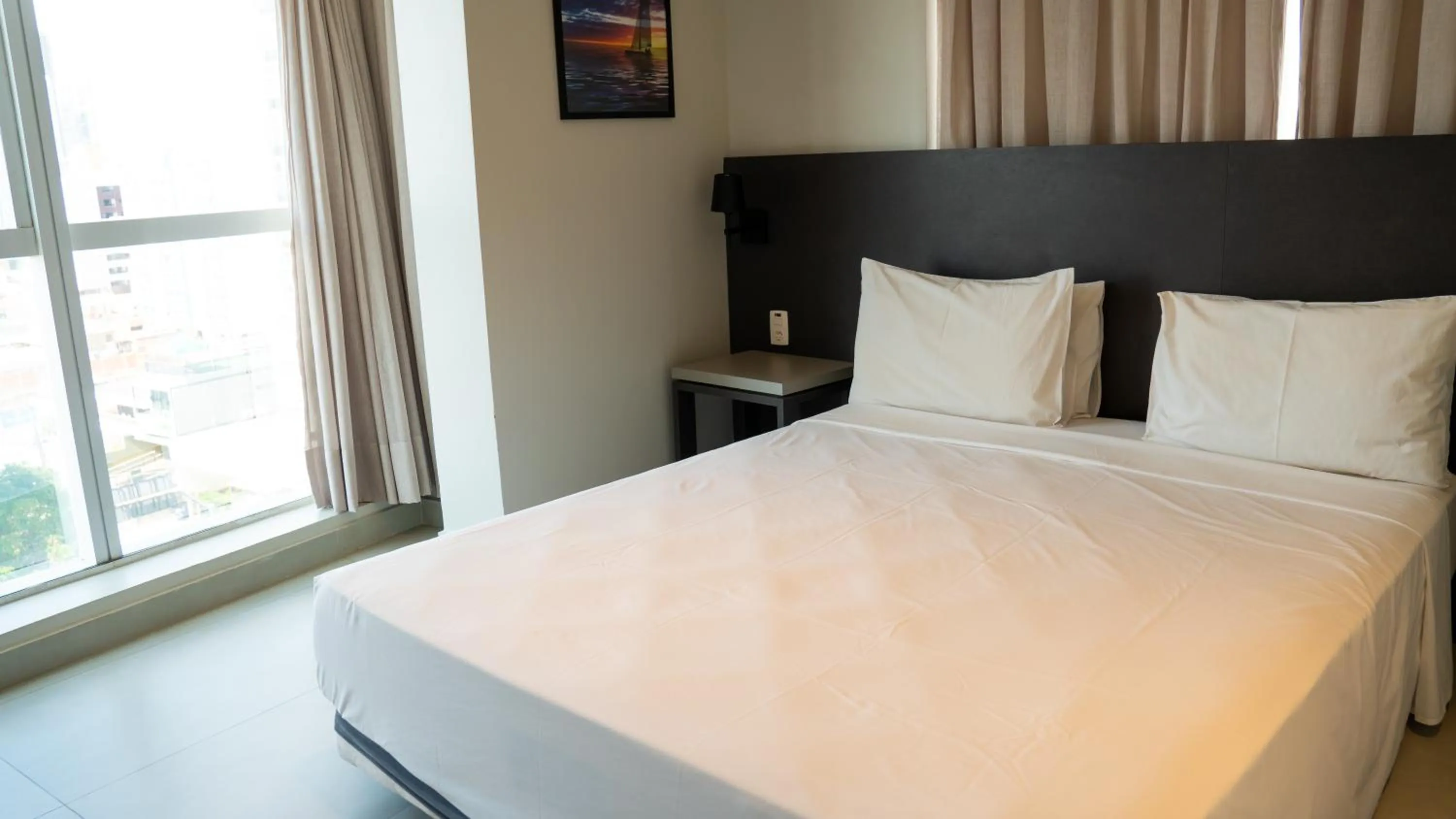 Bed in Quality Suítes João Pessoa