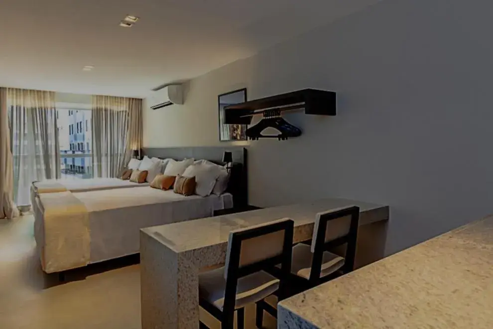 TV and multimedia, Bed in Quality Suítes João Pessoa TV and multimedia, Bed in Quality Suítes João Pessoa