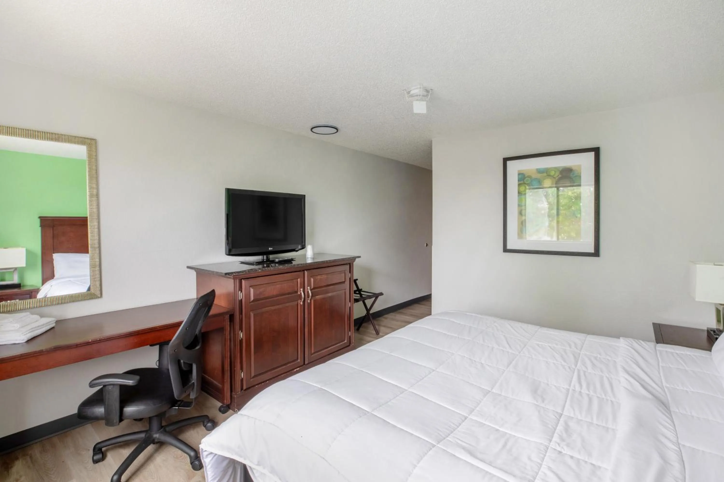 Bedroom, Bed in Super Inn by OYO Lansing MI