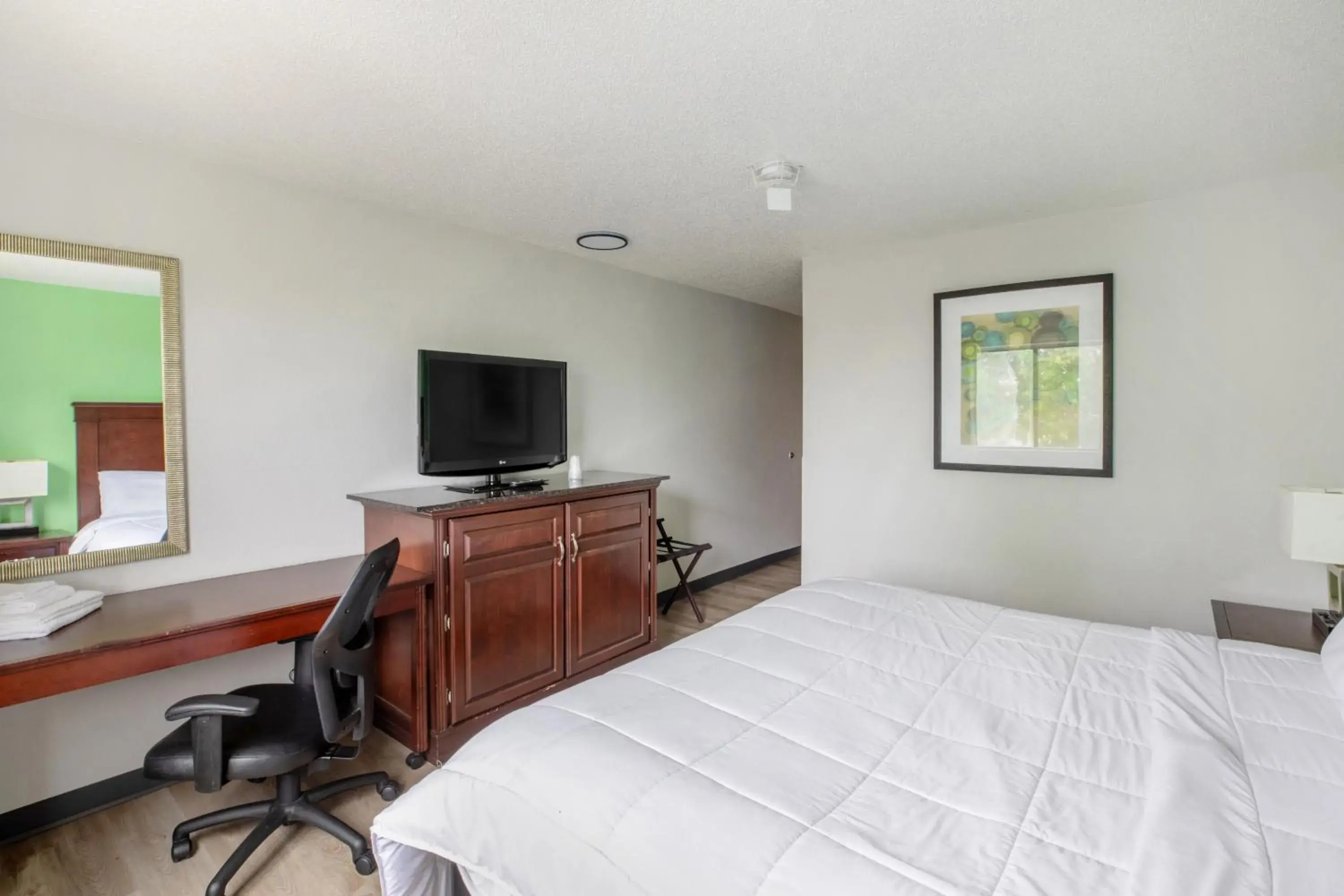 Bedroom, Bed in Super Inn by OYO Lansing MI Bedroom, Bed in Super Inn by OYO Lansing MI