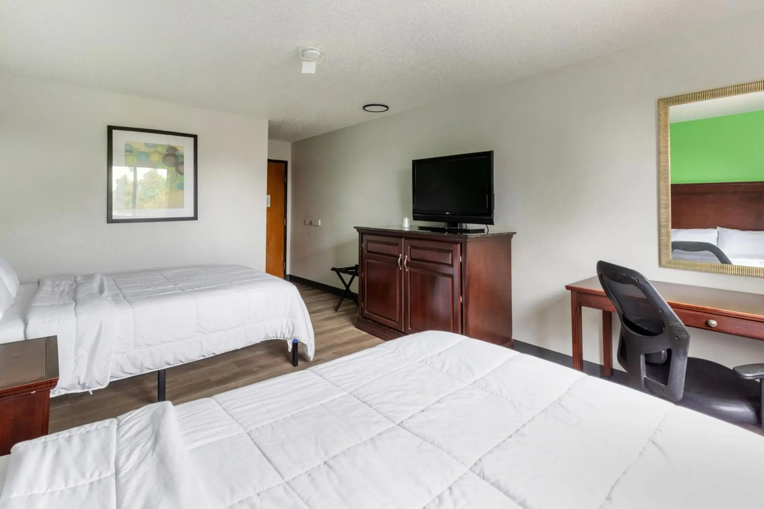 Bedroom, Bed in Super Inn by OYO Lansing MI Bedroom, Bed in Super Inn by OYO Lansing MI