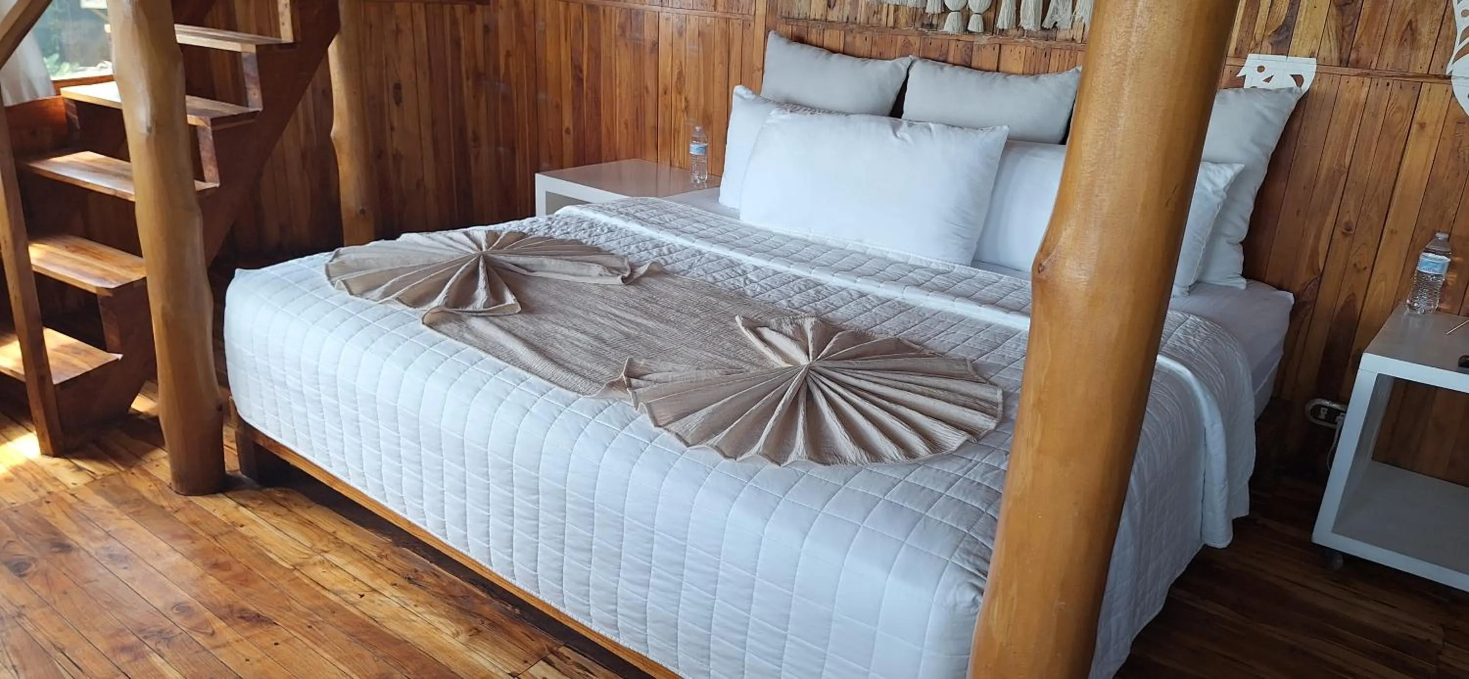 Bed in Hotel Tortuga Village