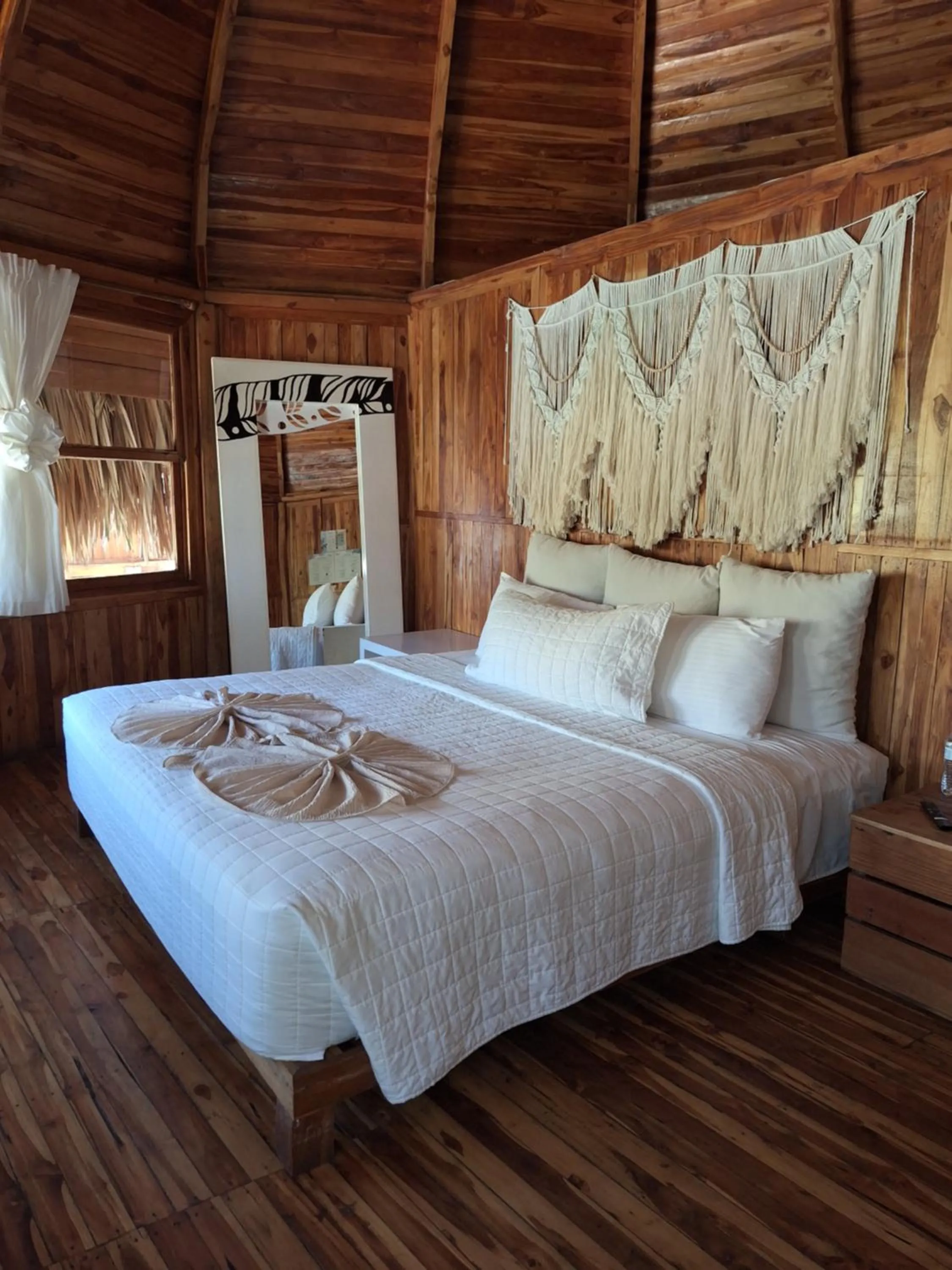Bed in Hotel Tortuga Village
