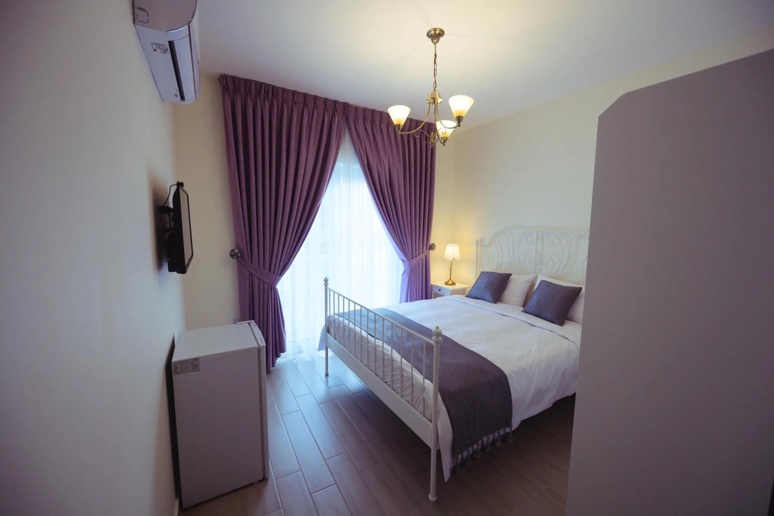 Bed in The Boutique Hotel Amman