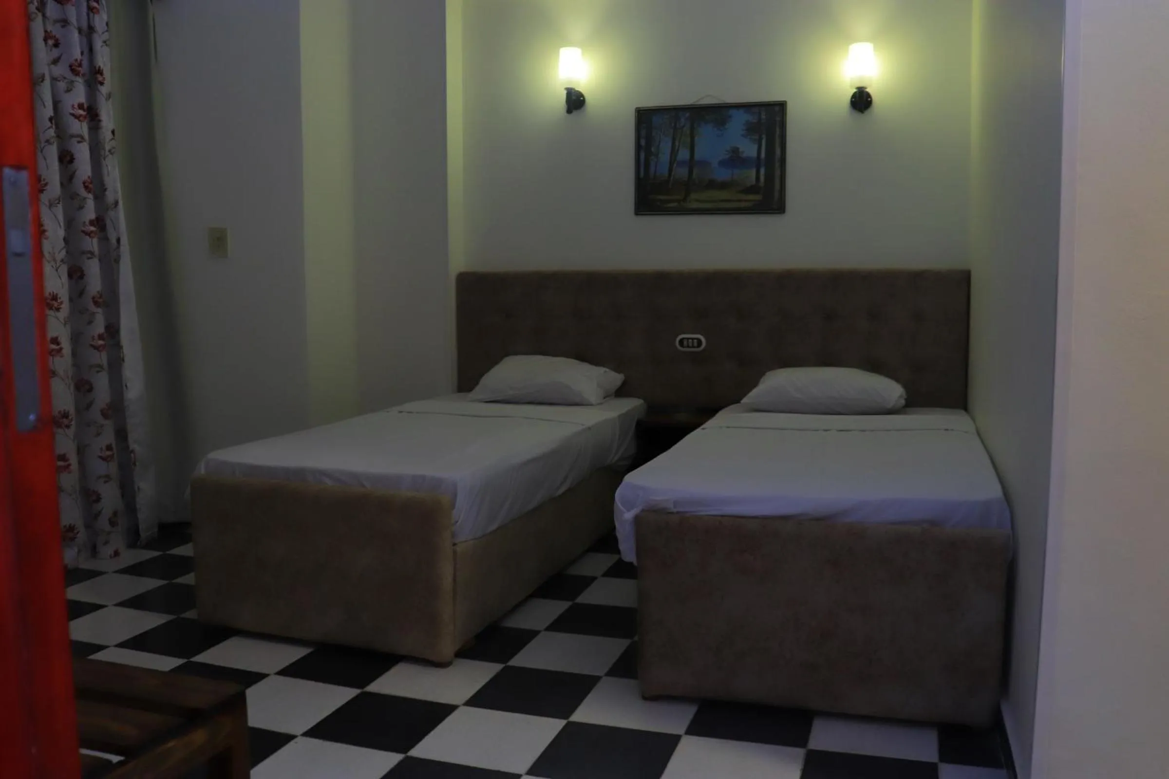 Bed in Royal City Hotel