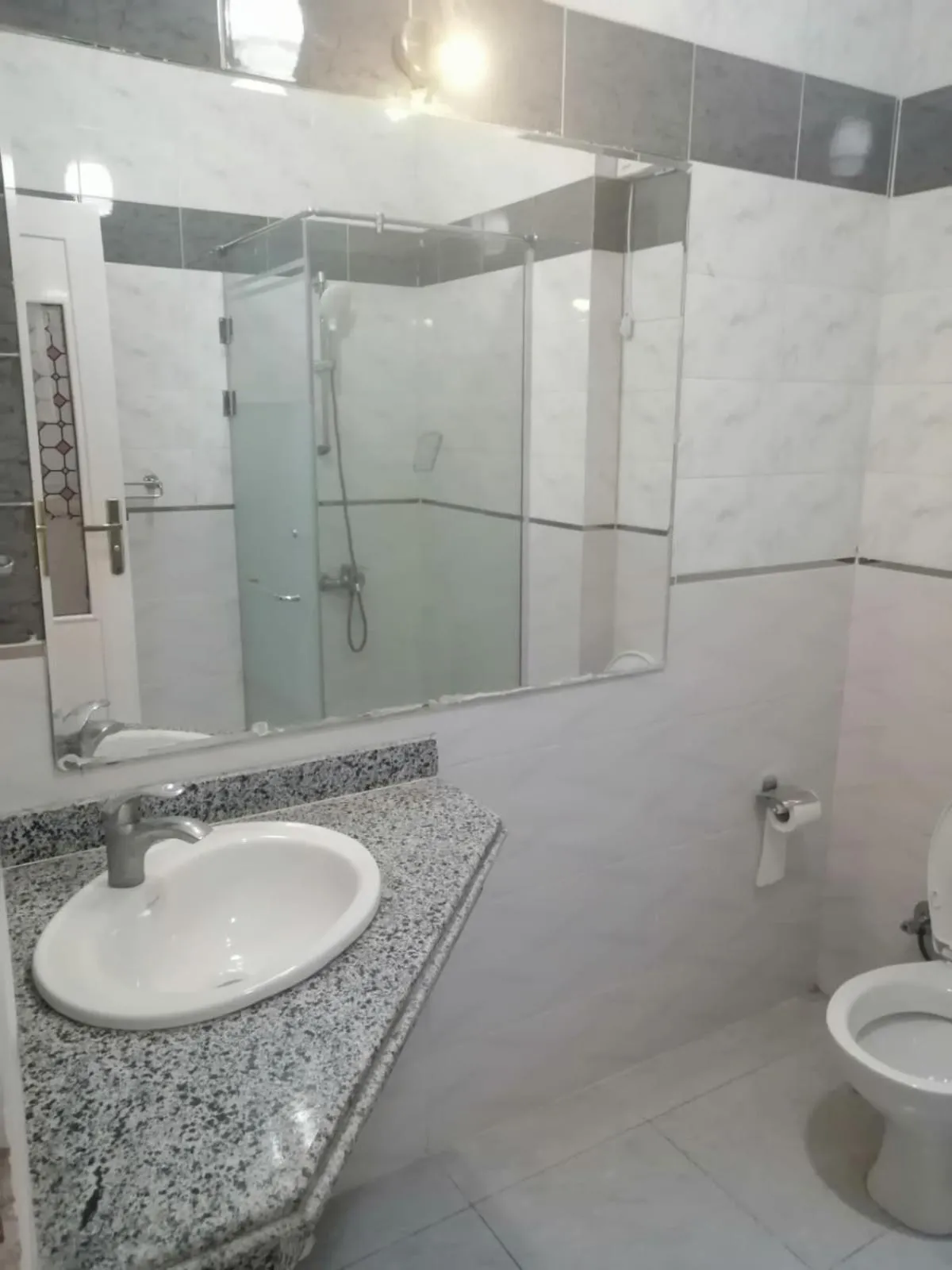 Toilet in Royal City Hotel