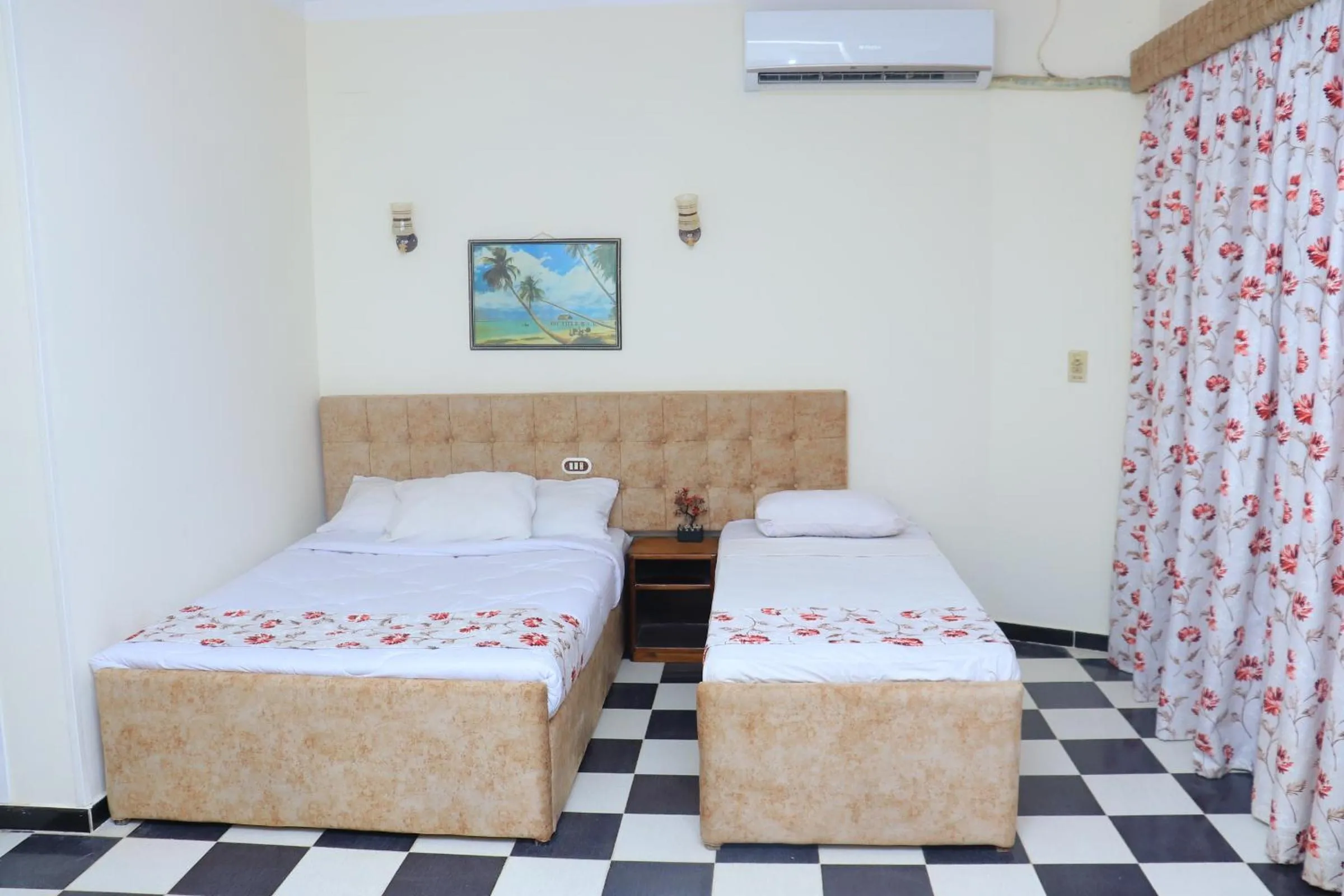 Bed in Royal City Hotel