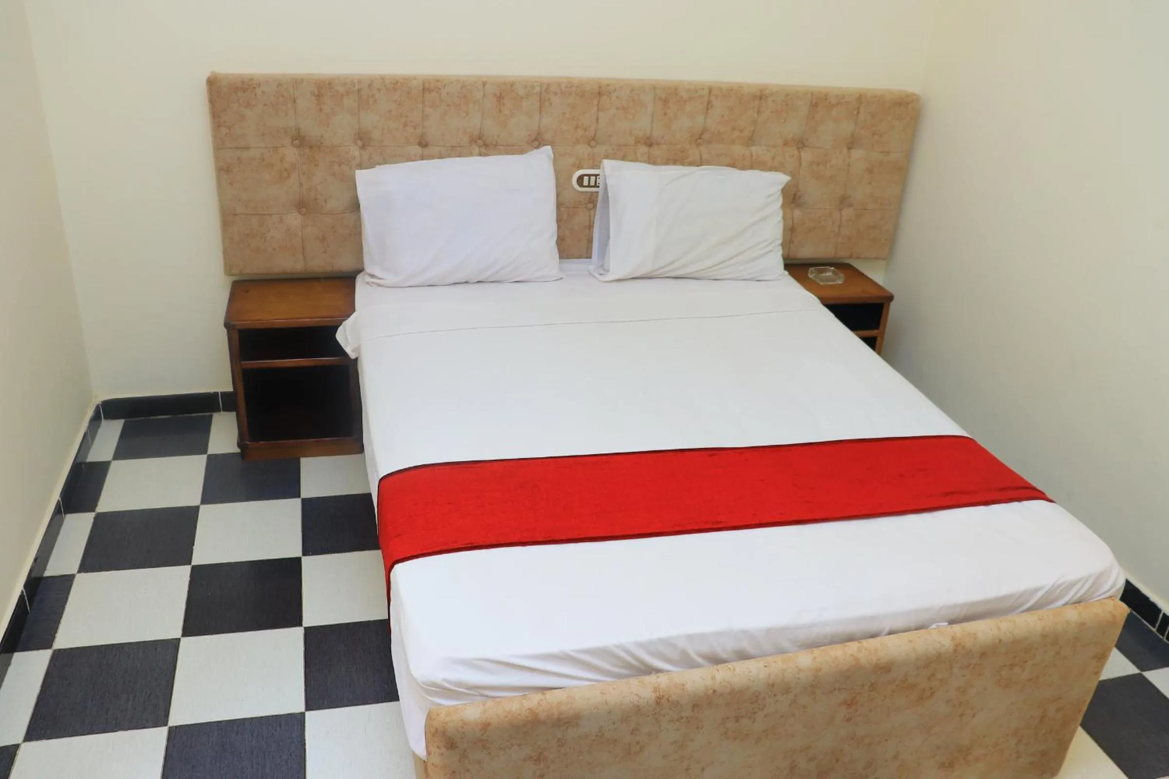 Bed in Royal City Hotel