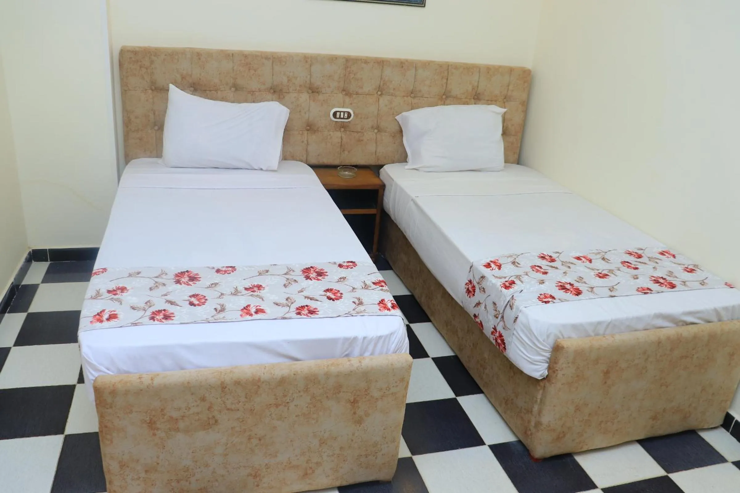 Bed in Royal City Hotel