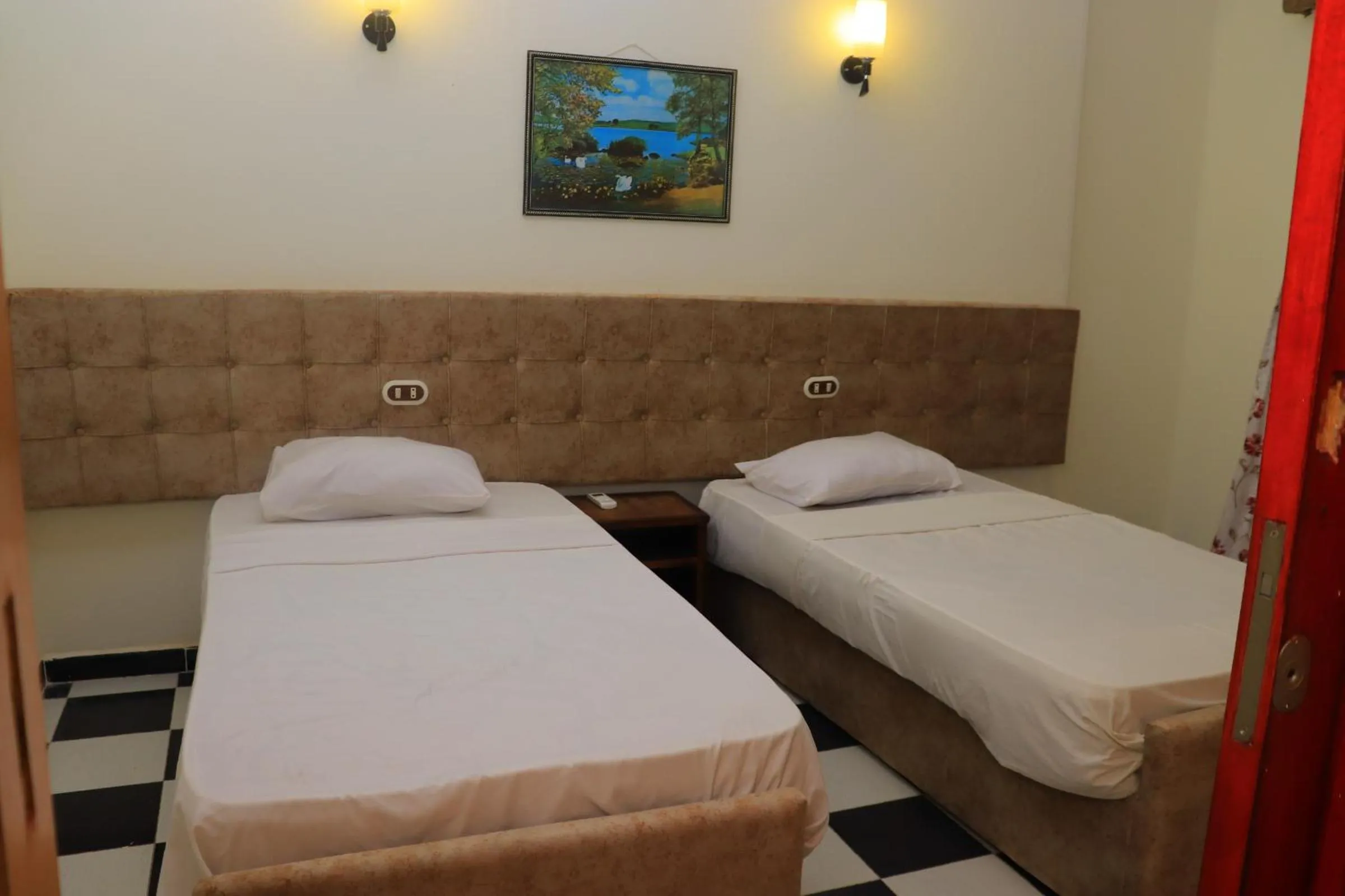 Bed in Royal City Hotel