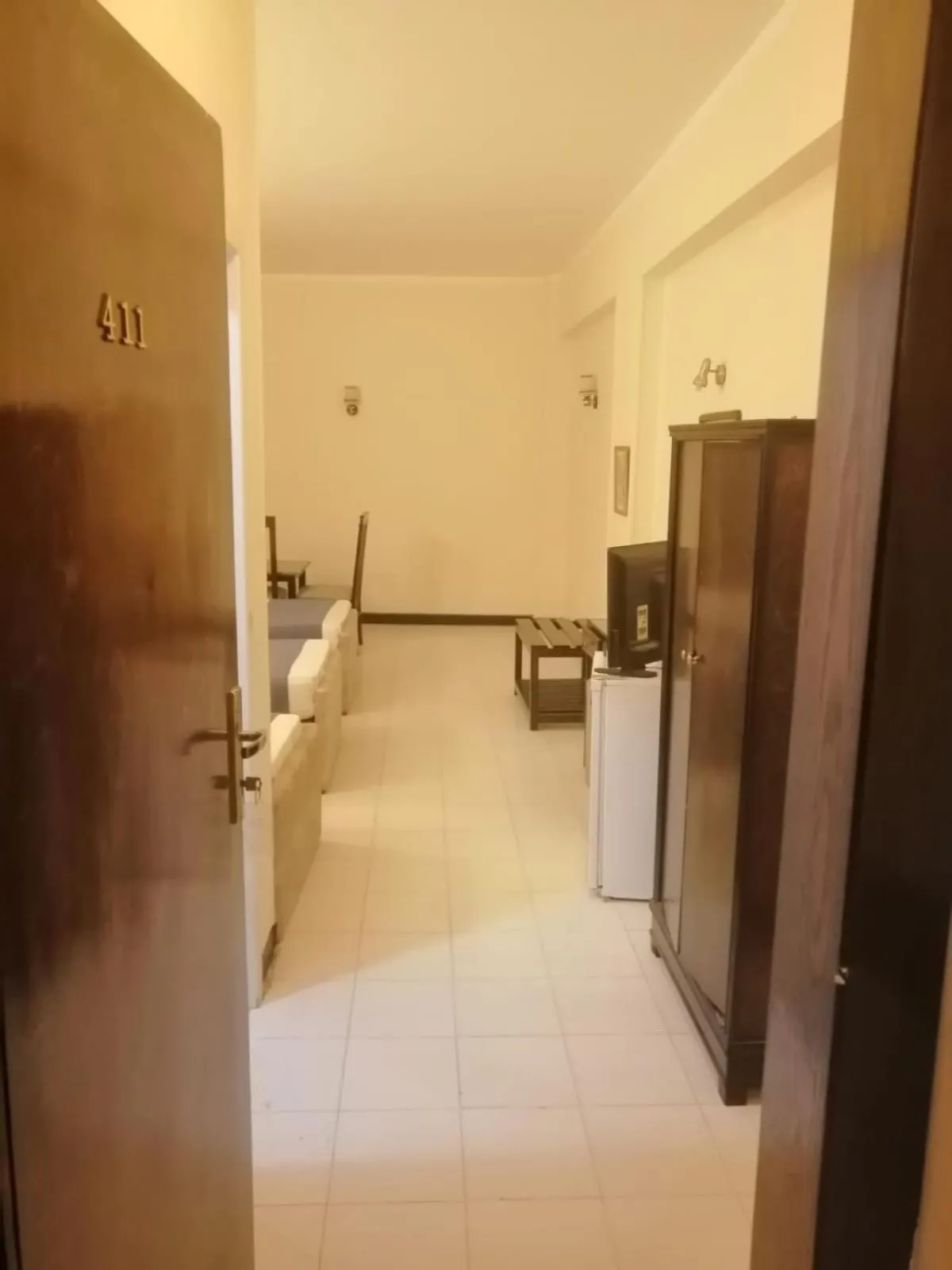 Bedroom in Royal City Hotel