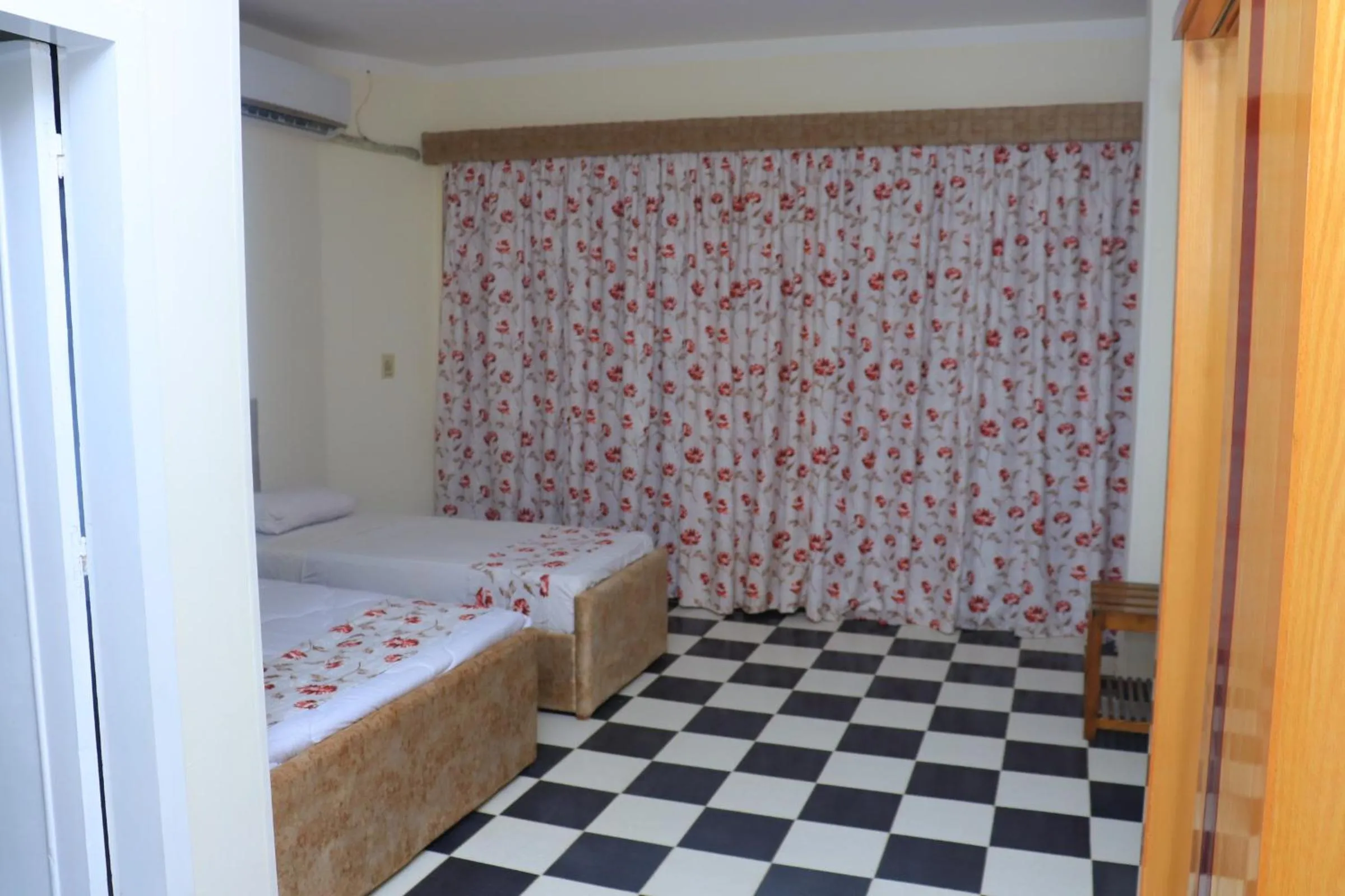 Bed in Royal City Hotel