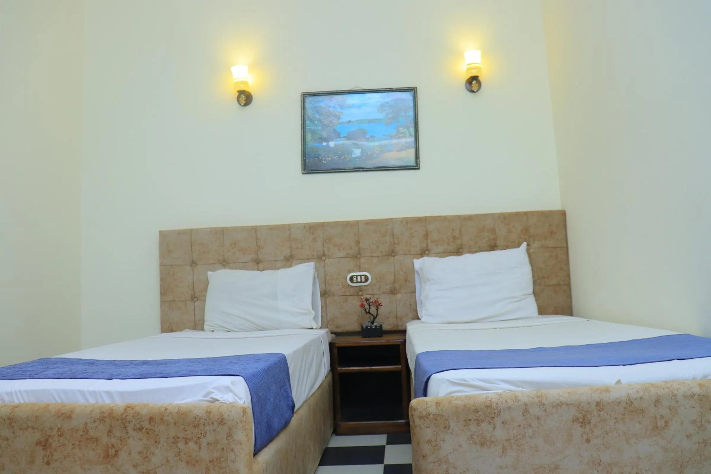 Bed in Royal City Hotel