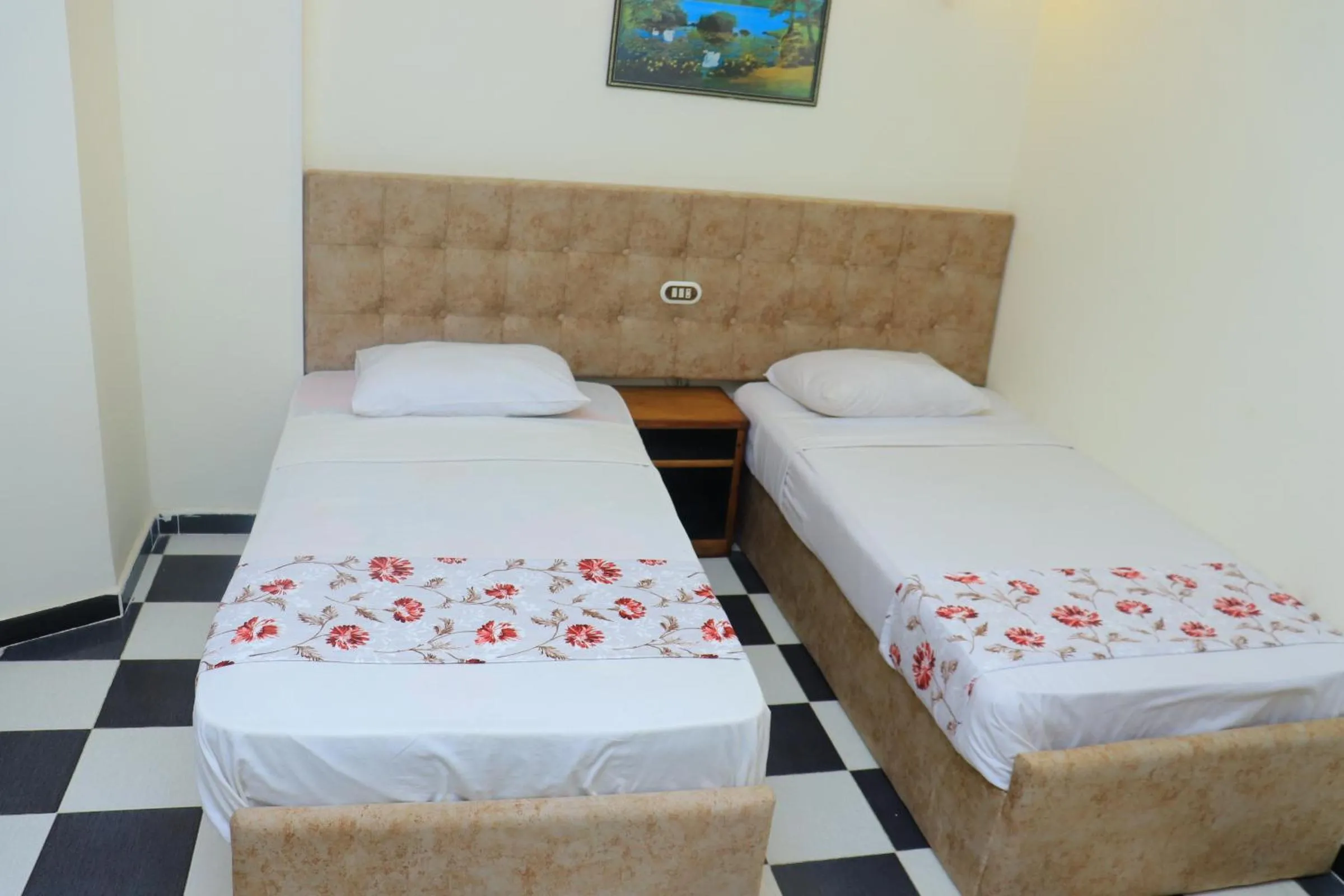 Bed in Royal City Hotel