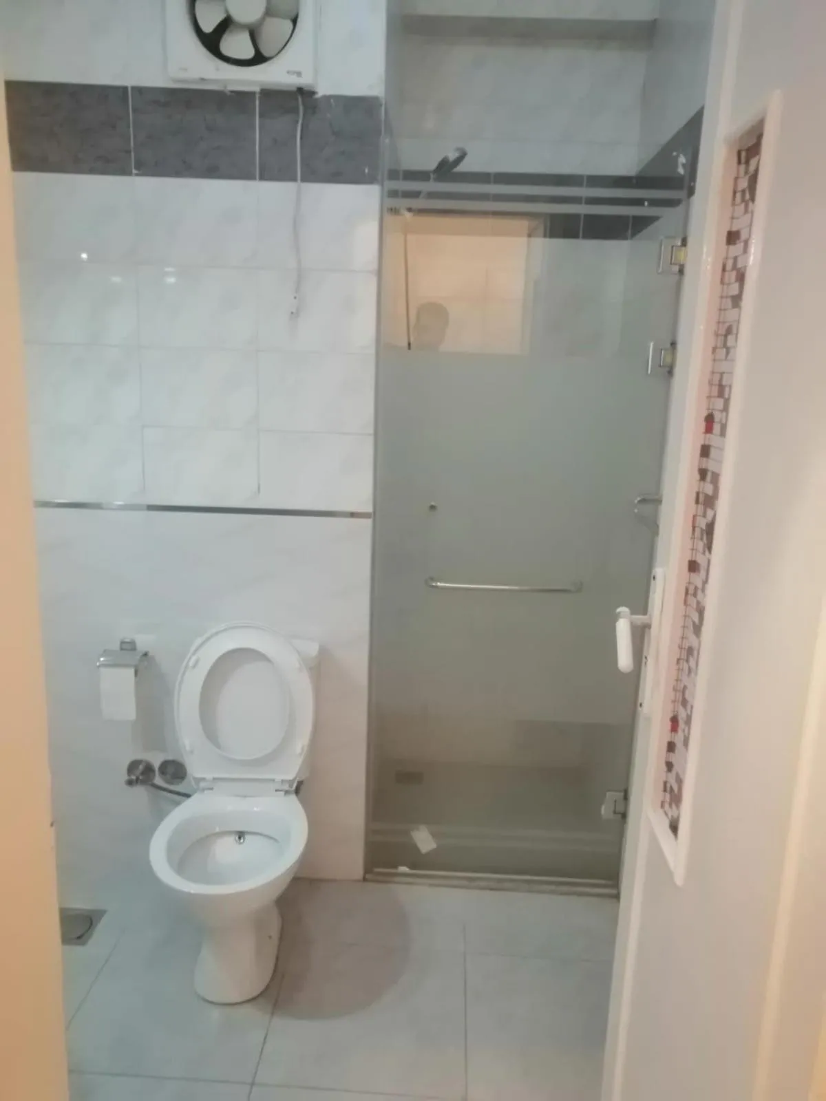 Toilet in Royal City Hotel
