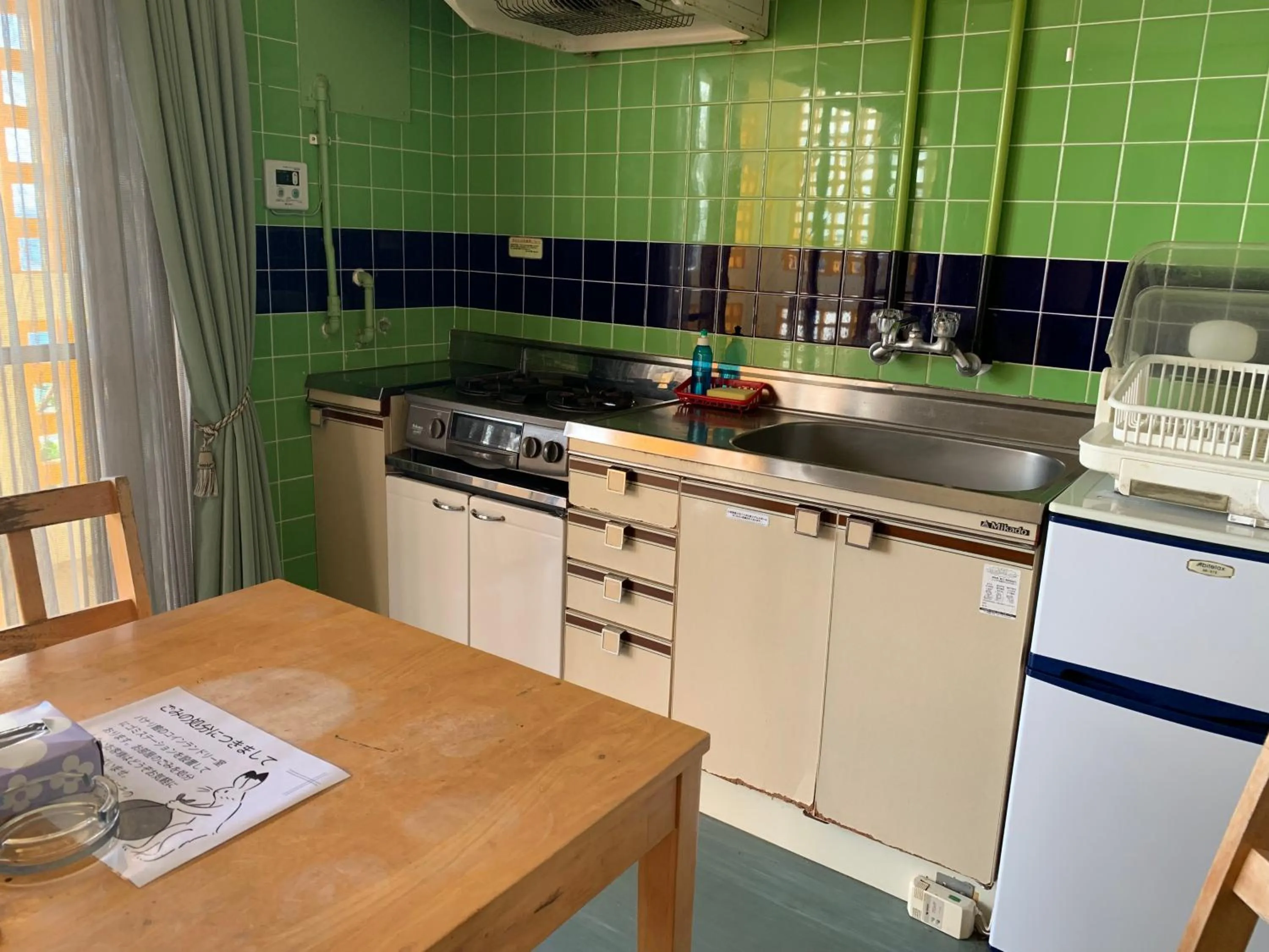 Kitchen or kitchenette in Hotel & Restaurant On the Beach Lue