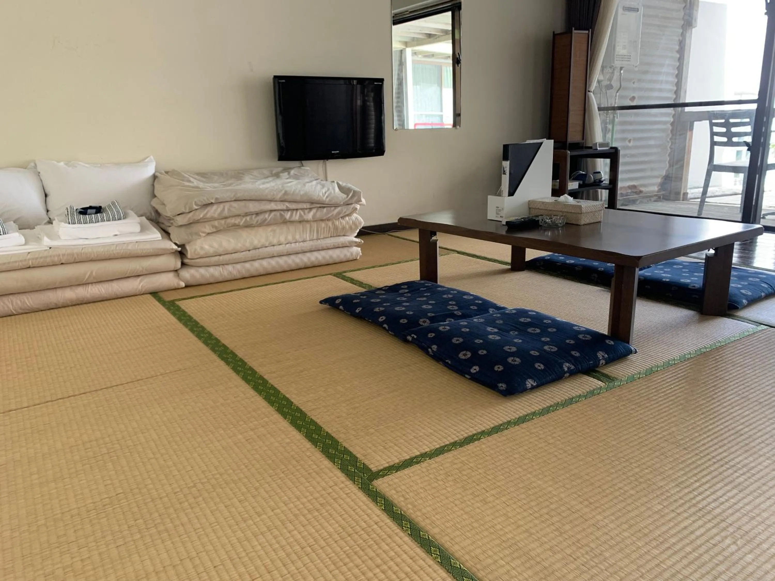 Photo of the whole room, Bed in Hotel & Restaurant On the Beach Lue